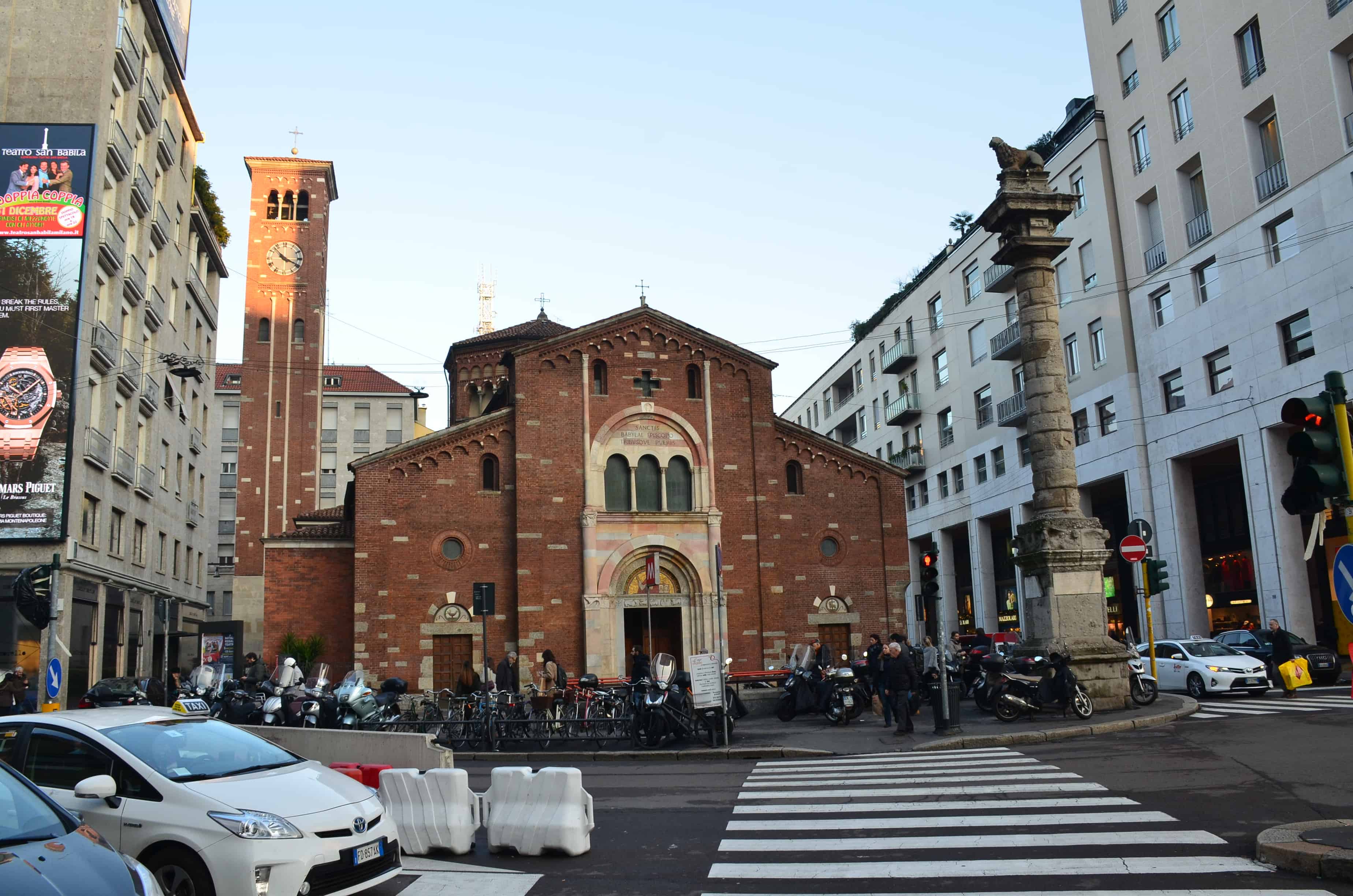 Basilica of San Babila with the Lion Column out front in Milan, Italy