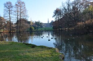 Pond looking towards Castello Sforzesco at Parco Sempione in Milan, Italy