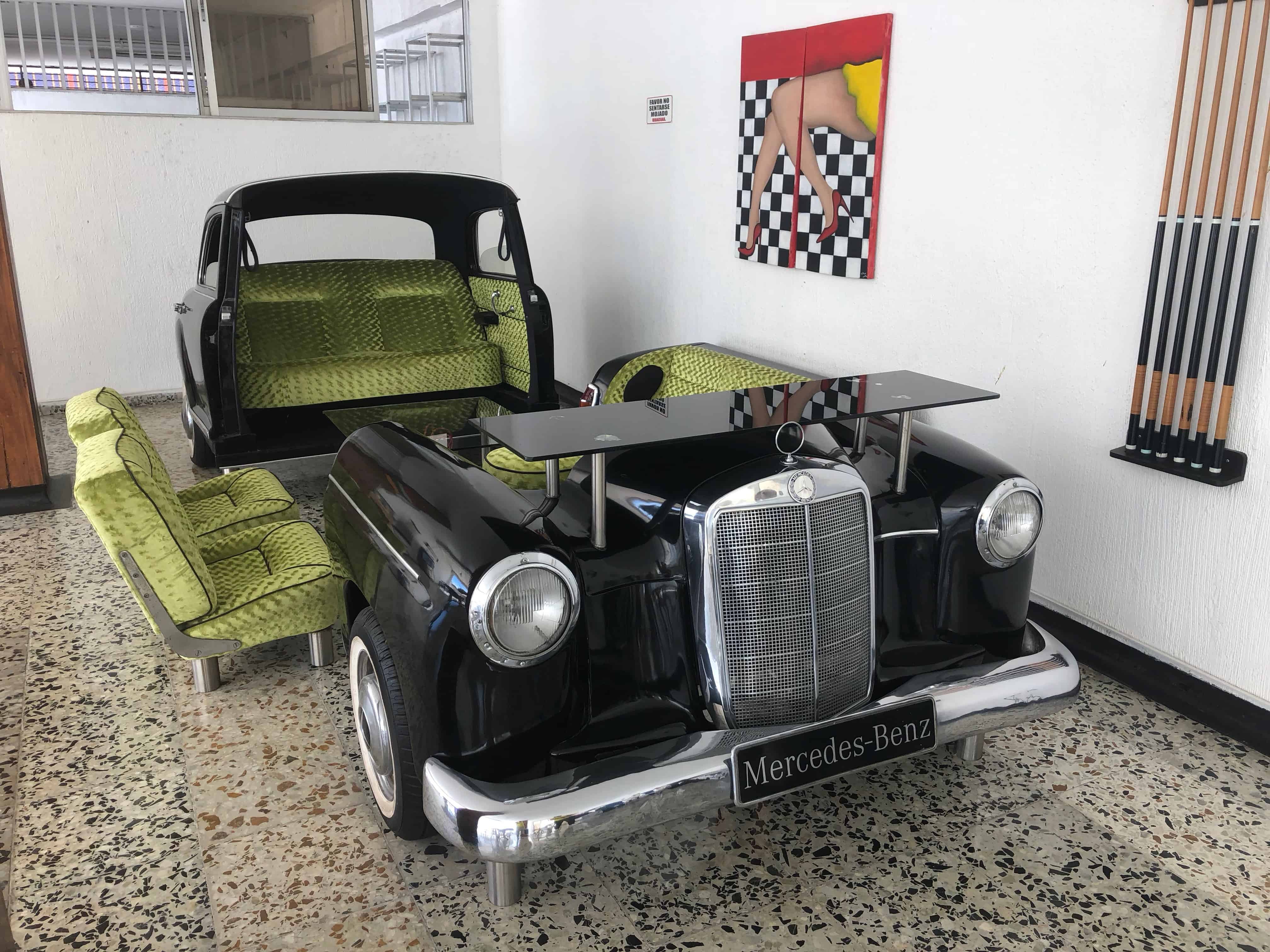 Classic car turned into a sitting area at Hotel Mall Santana del Río in La Dorada, Caldas, Colombia