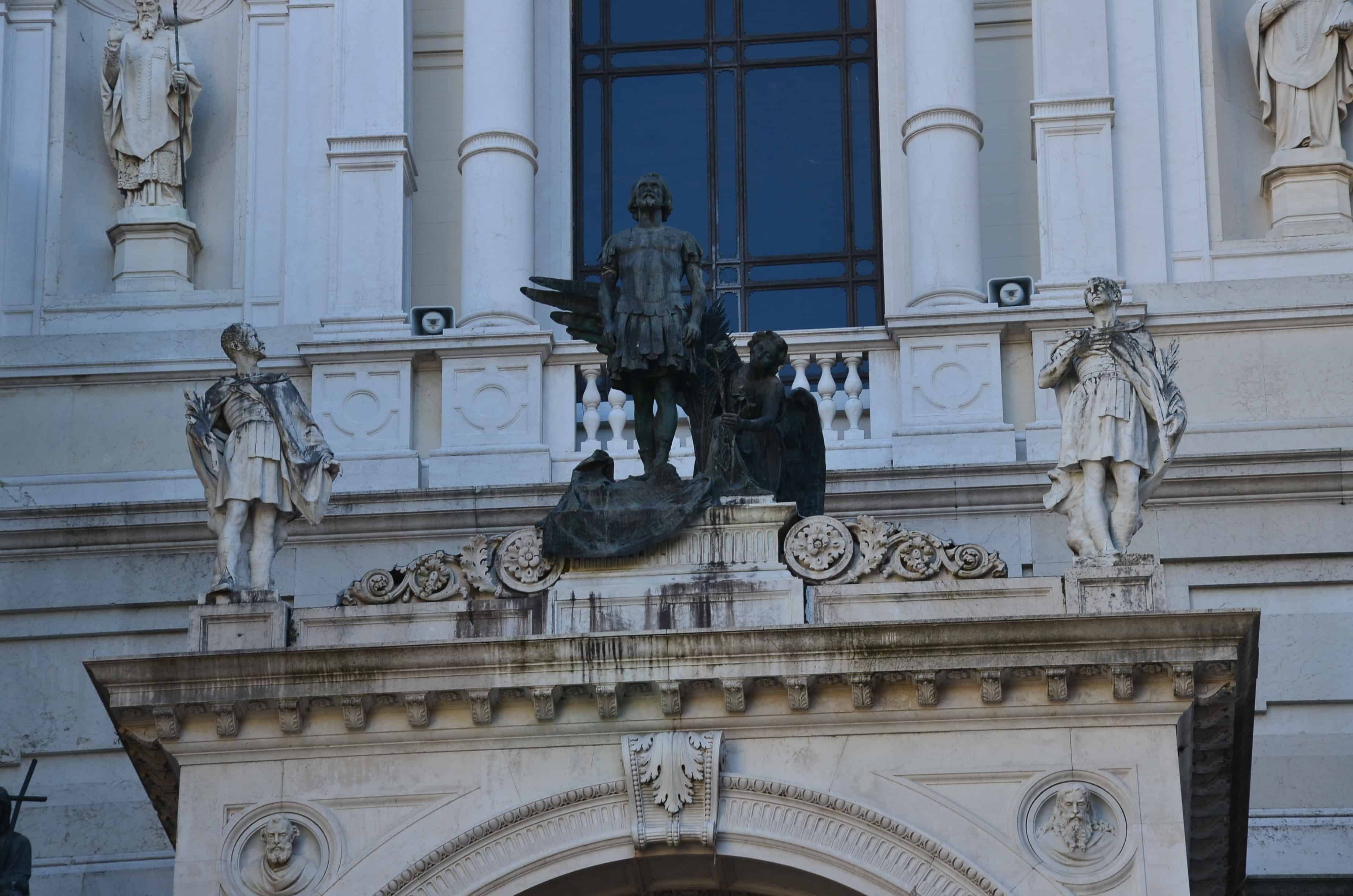 Statues above the entrance at Bergamo Cathedral in Bergamo, Italy