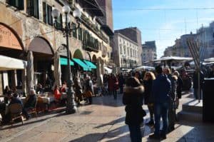 Cafés and restaurants on the square at Piazza delle Erbe in Verona, Italy