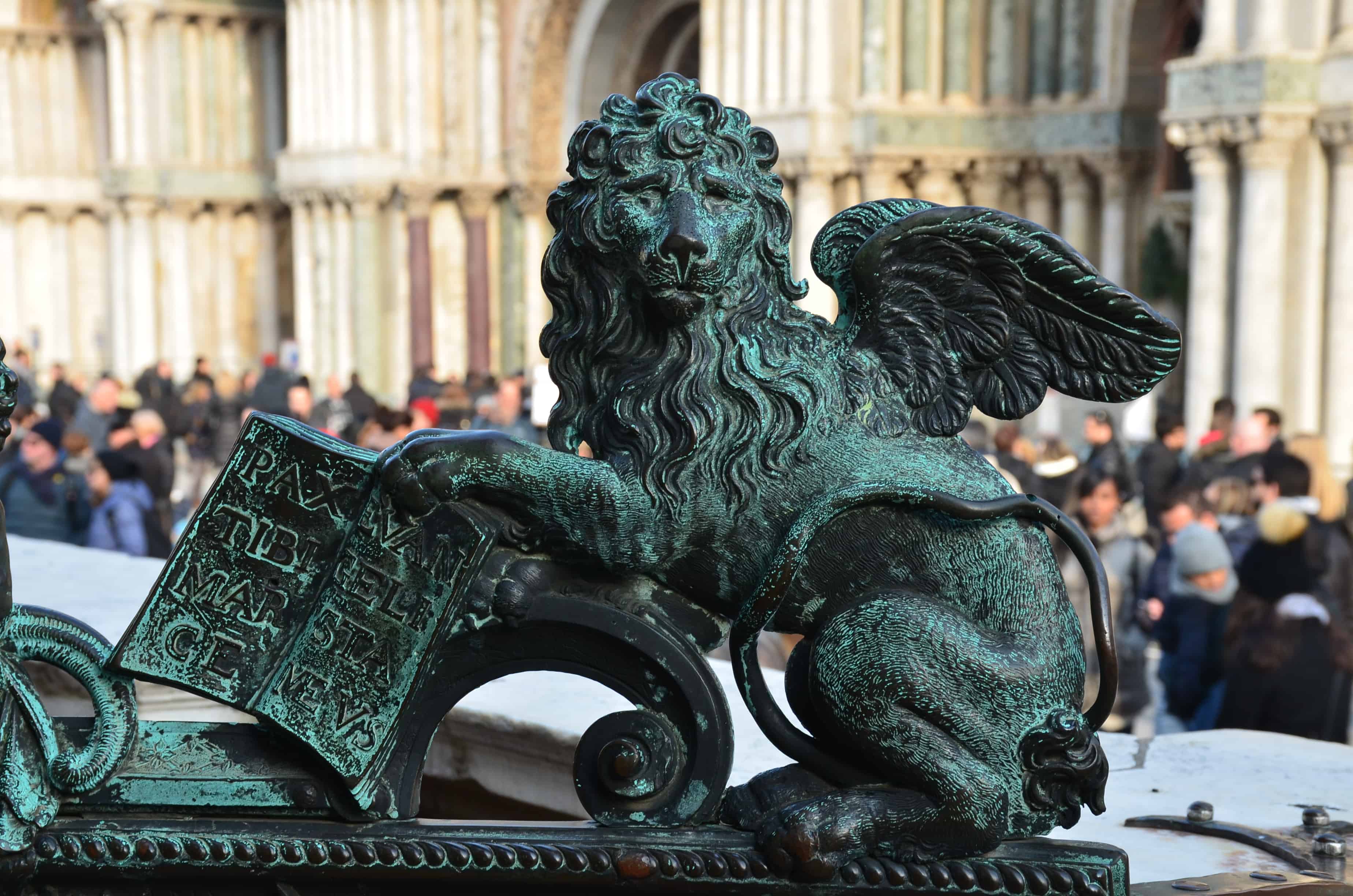 Lion of Saint Mark on the ornamental gate on Saint Mark's Campanile in Venice, Italy