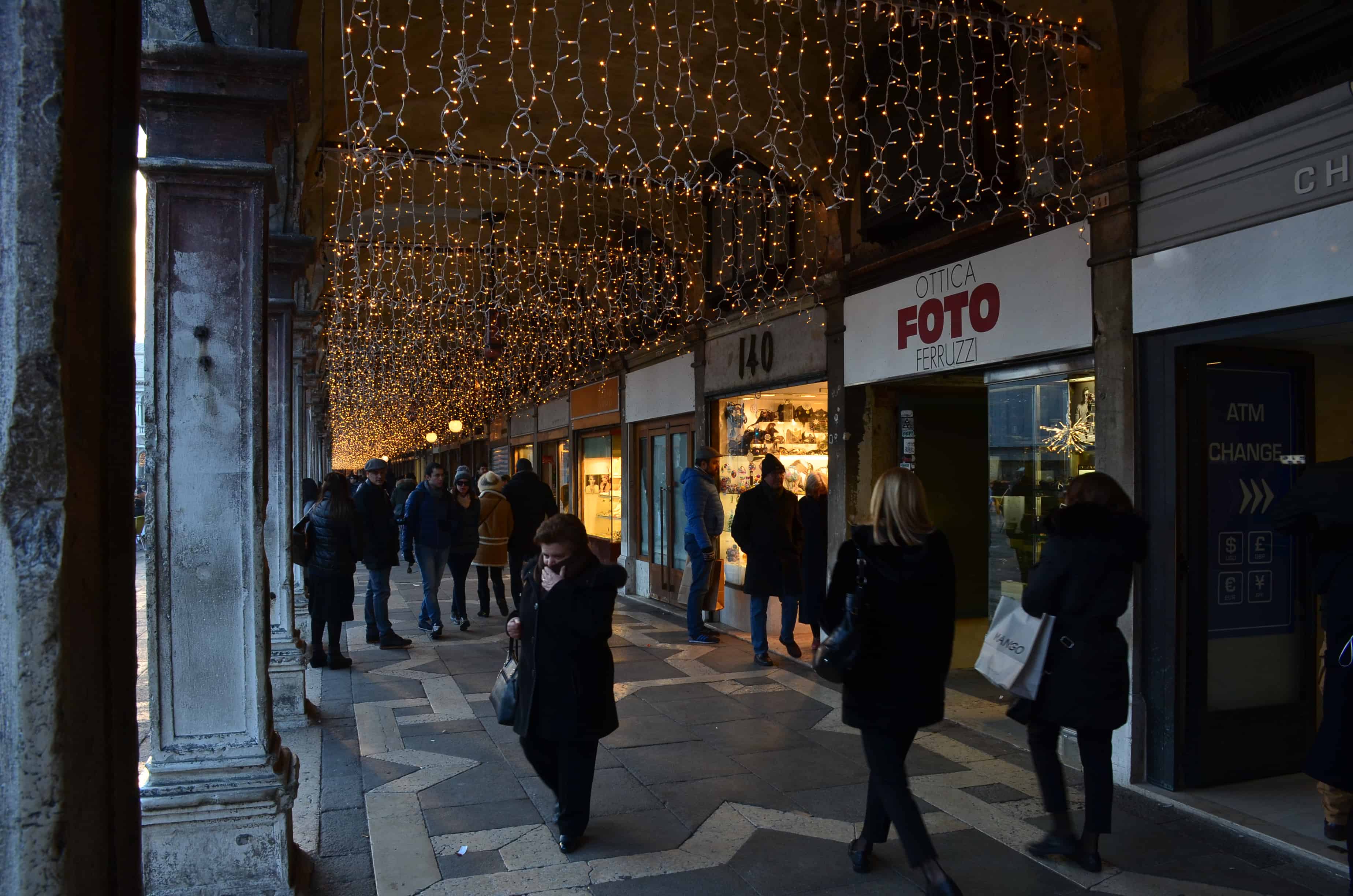 Under the portico of Old Procuratie in Venice, Italy