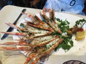 Grilled prawns at L'Olandese Volante in Venice, Italy