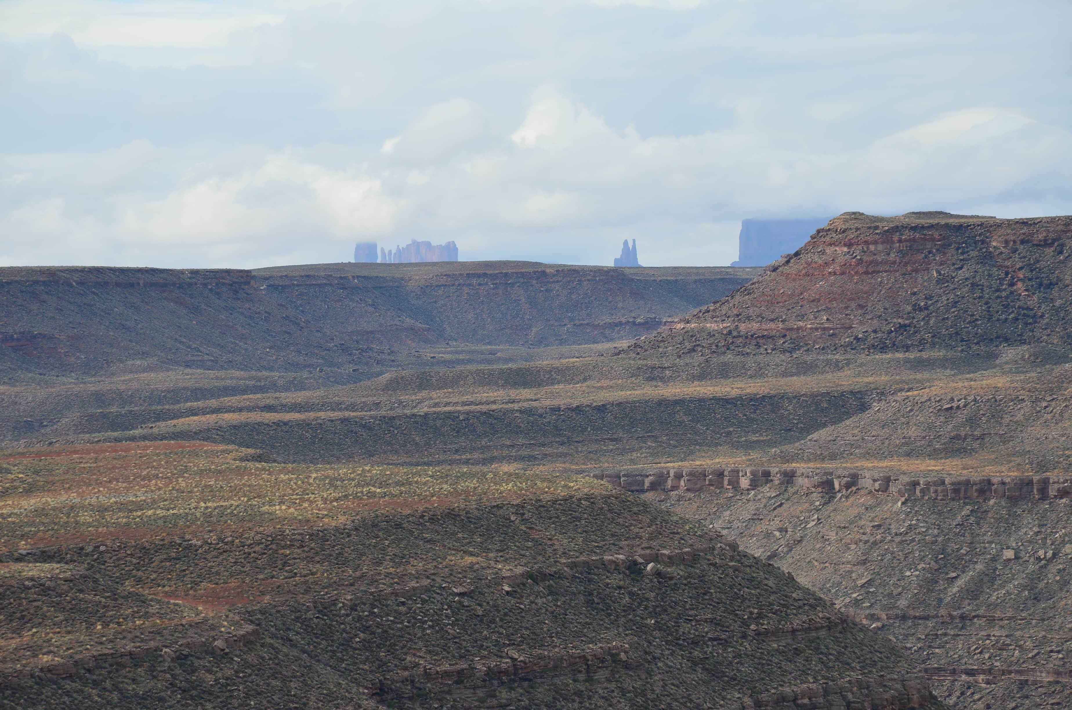 Monument Valley in the distance at Goosenecks State Park in Utah