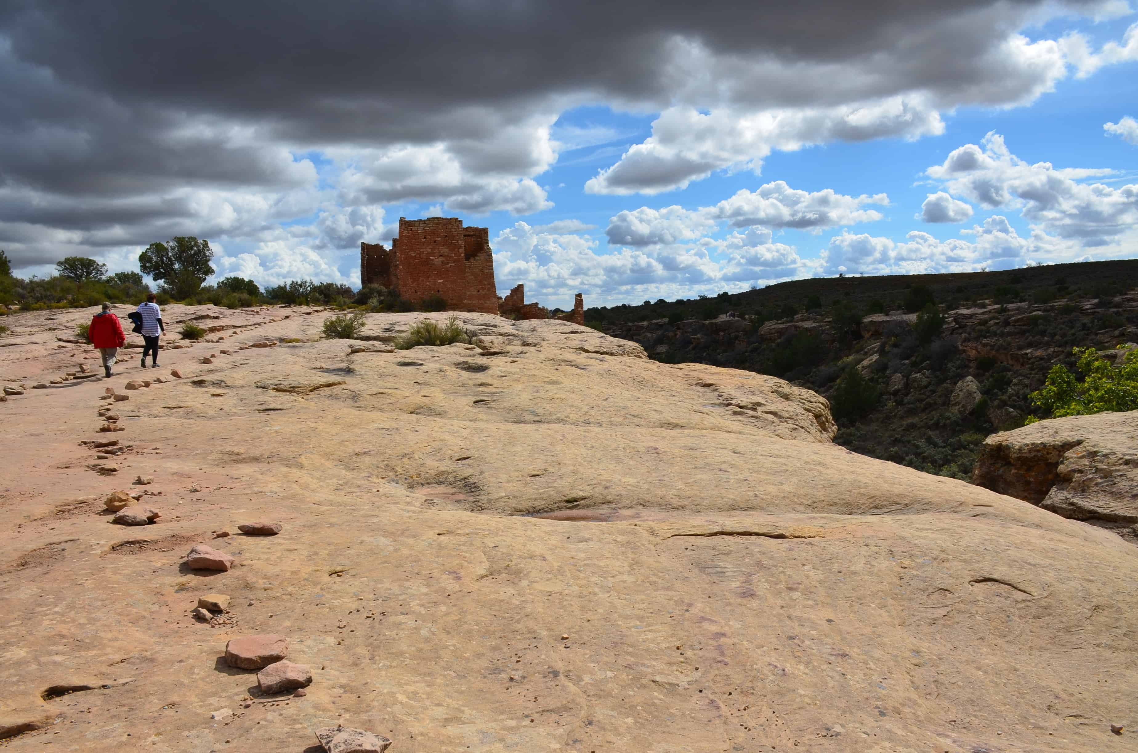 Walking towards Hovenweep Castle at Hovenweep National Monument in Utah