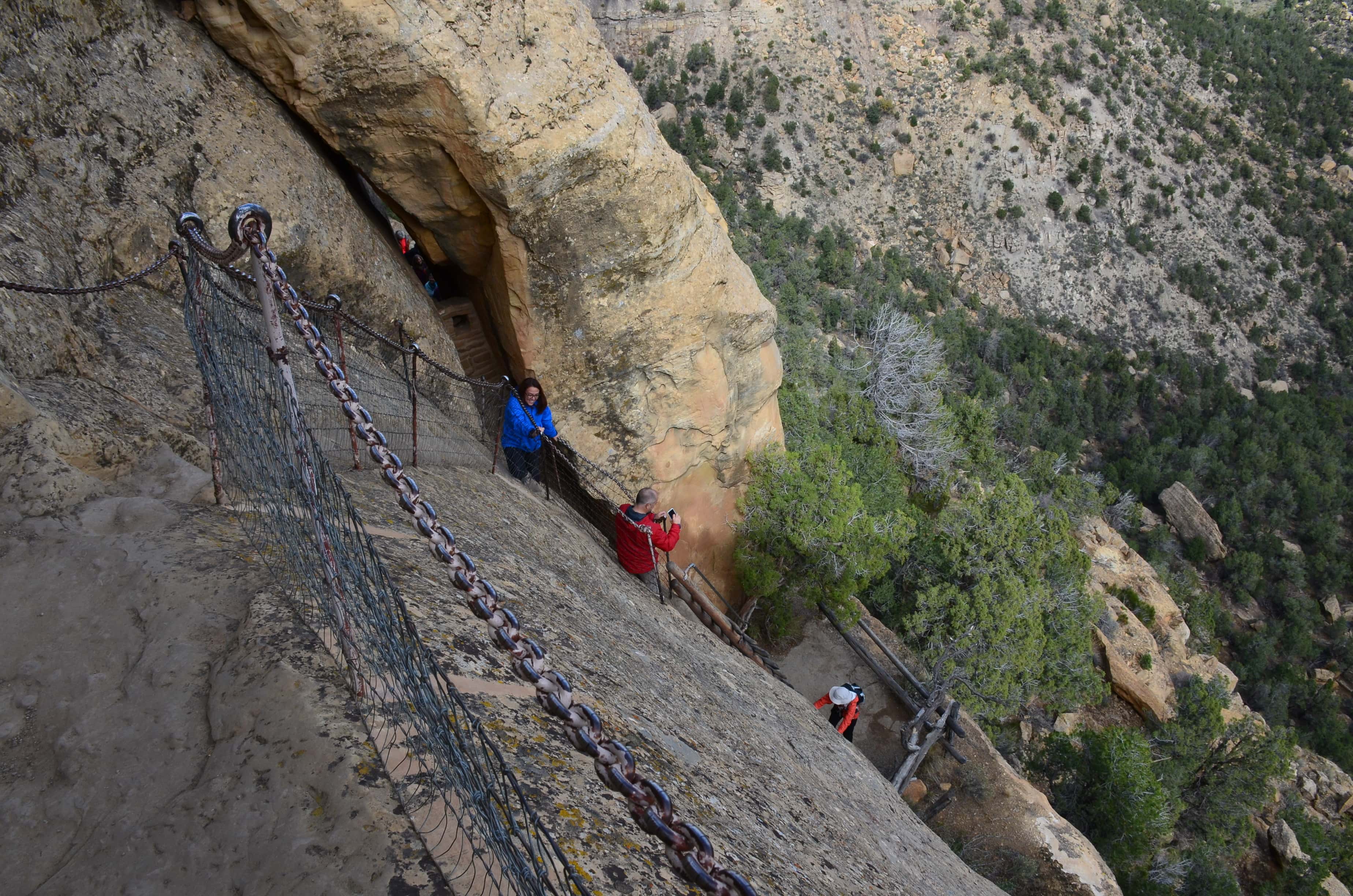 Gönül and Martin climbing up the steps on the Balcony House tour at Mesa Verde National Park in Colorado