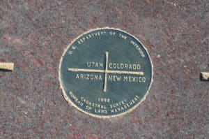 Official border at the Four Corners Monument at the New Mexico, Utah, Arizona, and Colorado Border