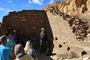 Ranger giving a lecture at the site at Hungo Pavi at Chaco Culture National Historical Park in New Mexico