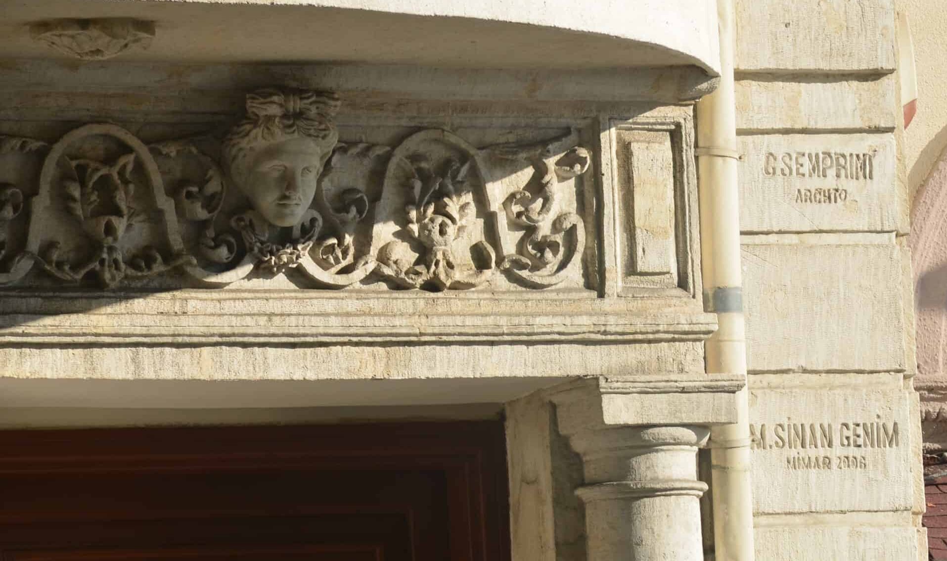 Architects's signature and ornamental stonework on the Istanbul Research Institute in Tepebaşı, Istanbul, Turkey