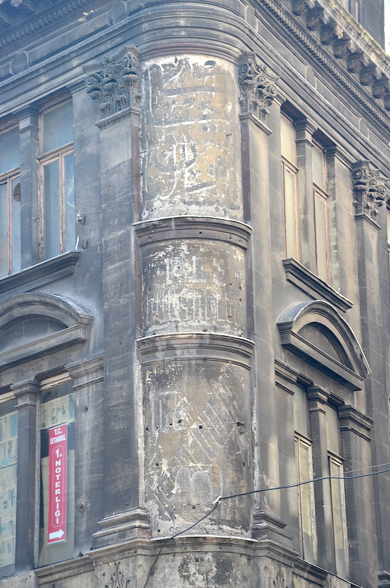 Faded advertisements on Sadıkiye Han in Eminönü, Istanbul, Turkey