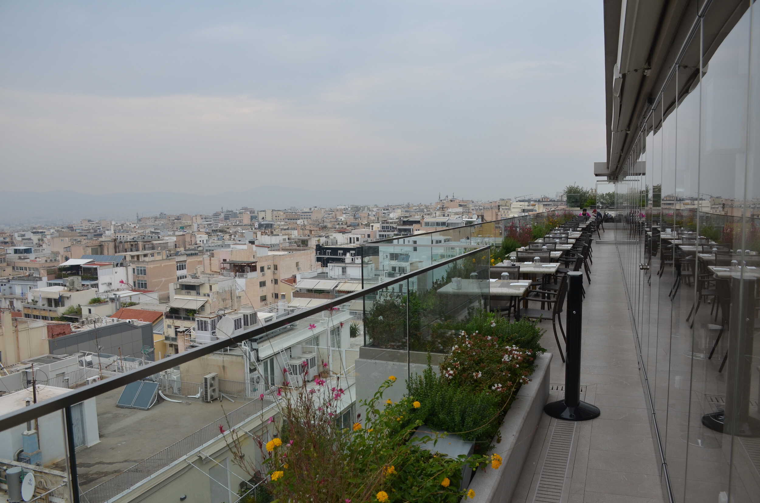 Rooftop restaurant seating at the Electra Metropolis Hotel in Athens, Greece