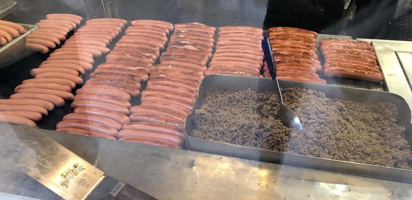 Dogs on the grill at American Coney Island