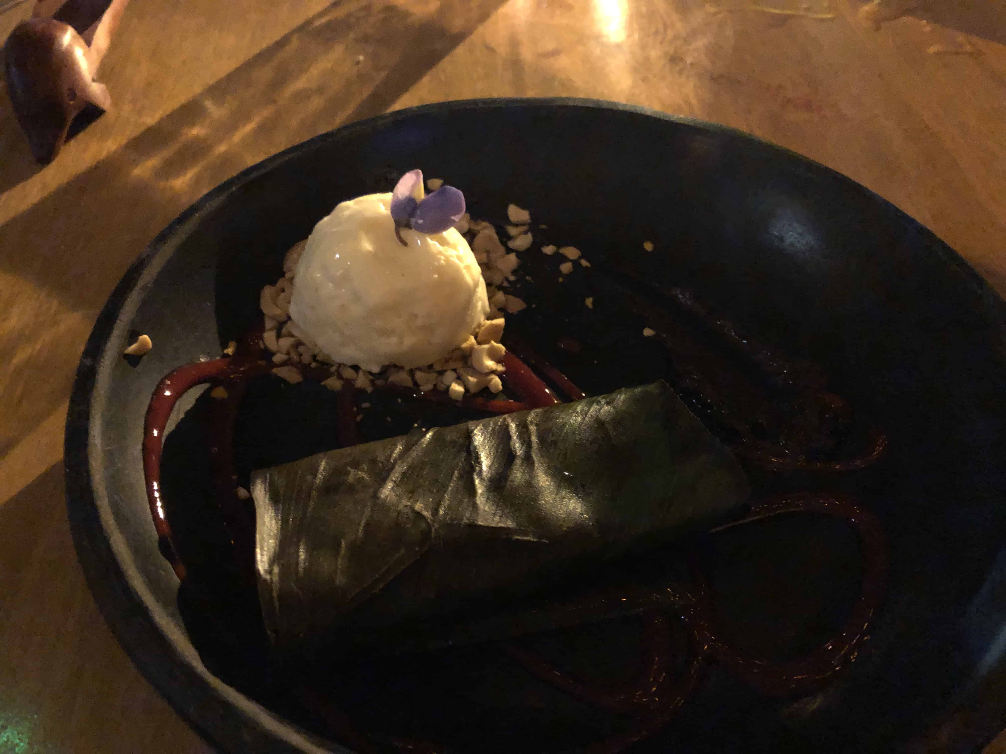 Brownie wrapped in a leaf served with ice cream at Juräkub in El Poblado, Medellín, Antioquia, Colombia