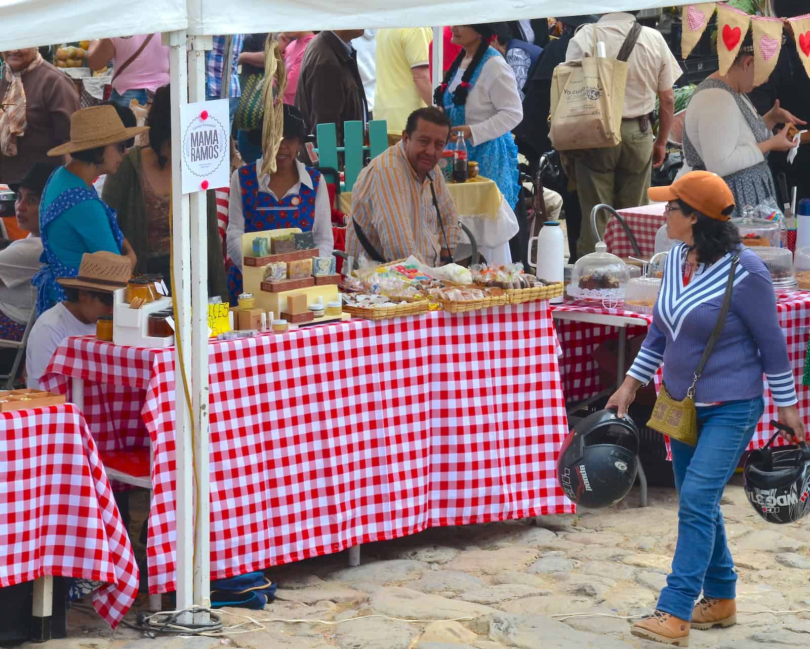 A vendor selling soap and candy at the Saturday Market