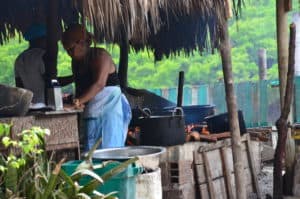 A woman cooking lunch at Don Goyo
