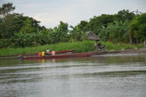 Men in a boat on the Magdalena River