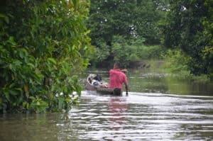 A man paddling down the canal