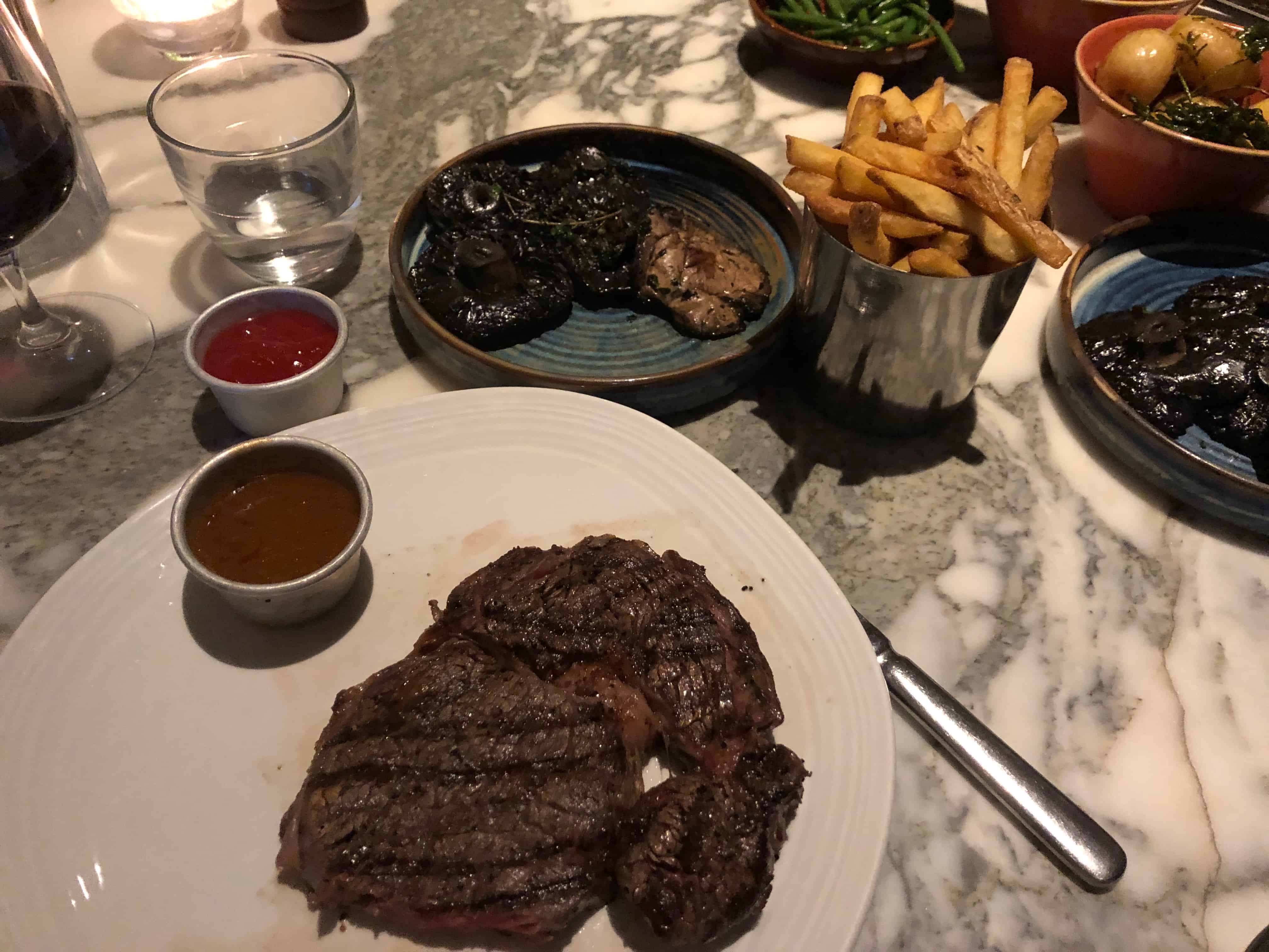 Steak and sides at Sophie's Soho