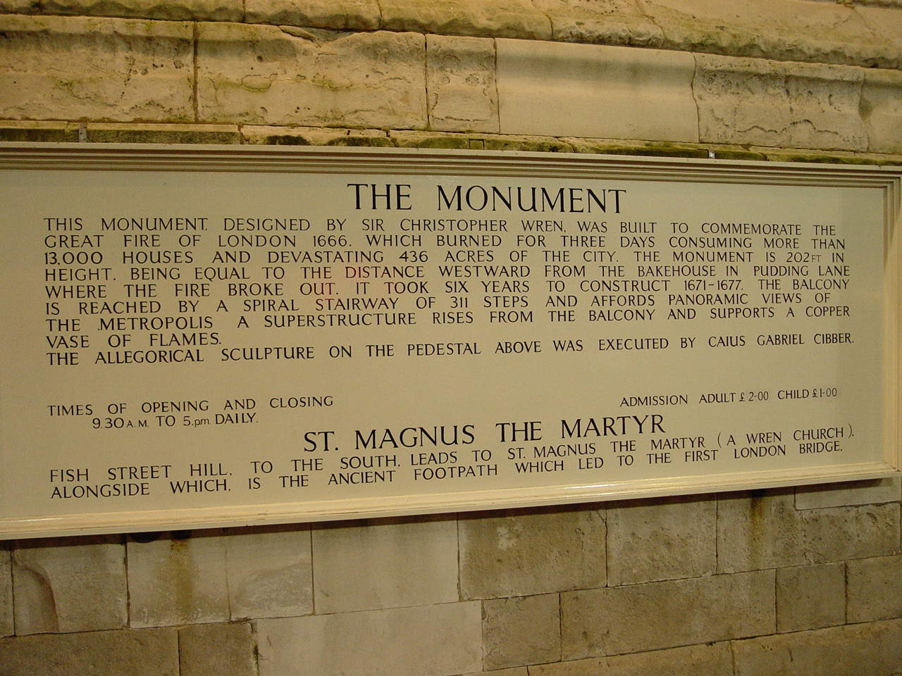 Plaque on the base of the Monument in the City of London, England