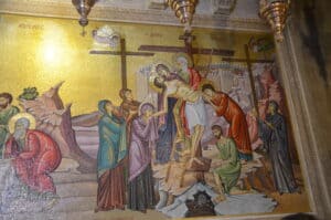 Descent from the Cross on the mosaic on the wall behind the Stone of Unction in the Church of the Holy Sepulchre in Jerusalem