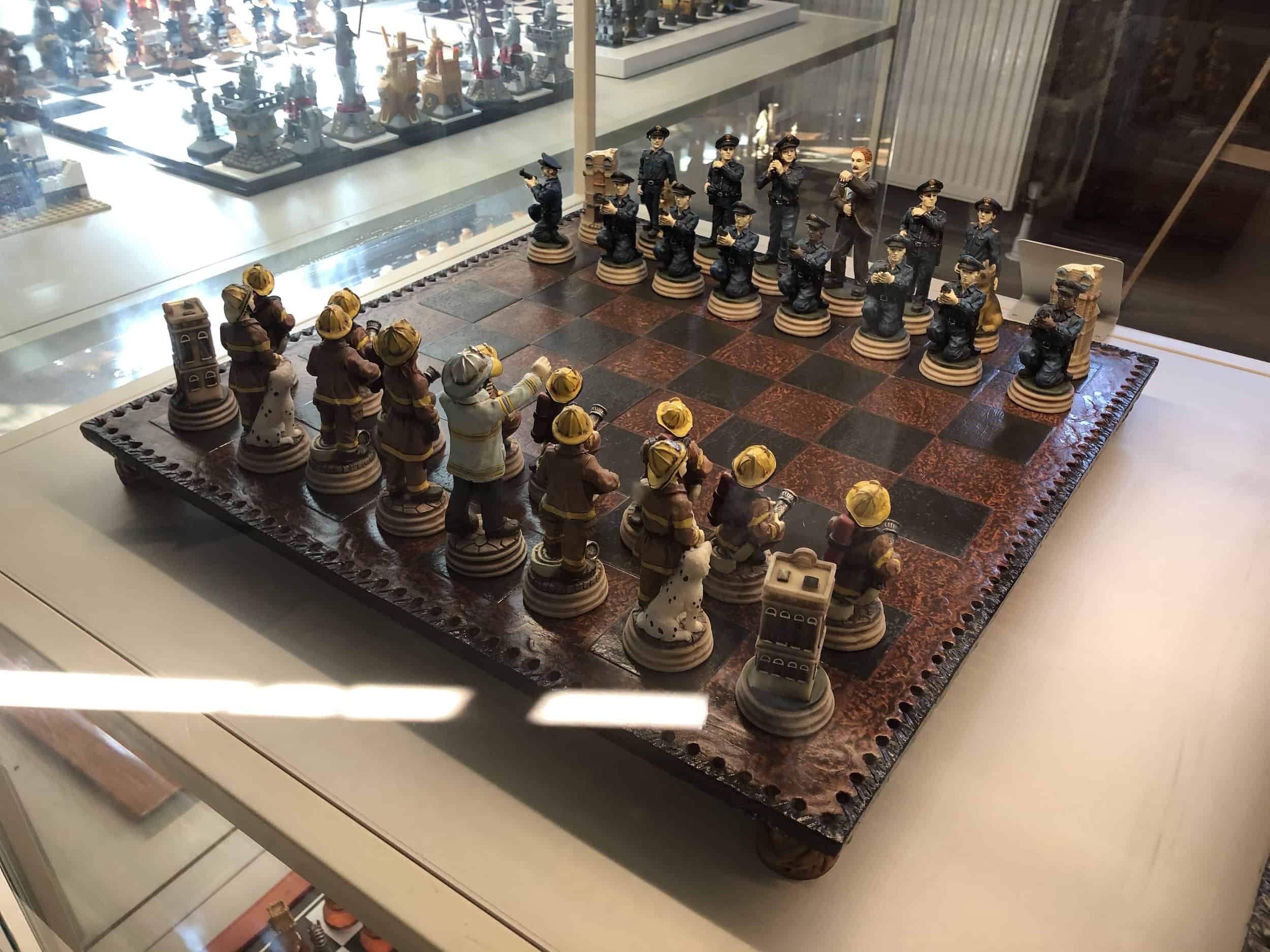 Police vs firefighters chess set