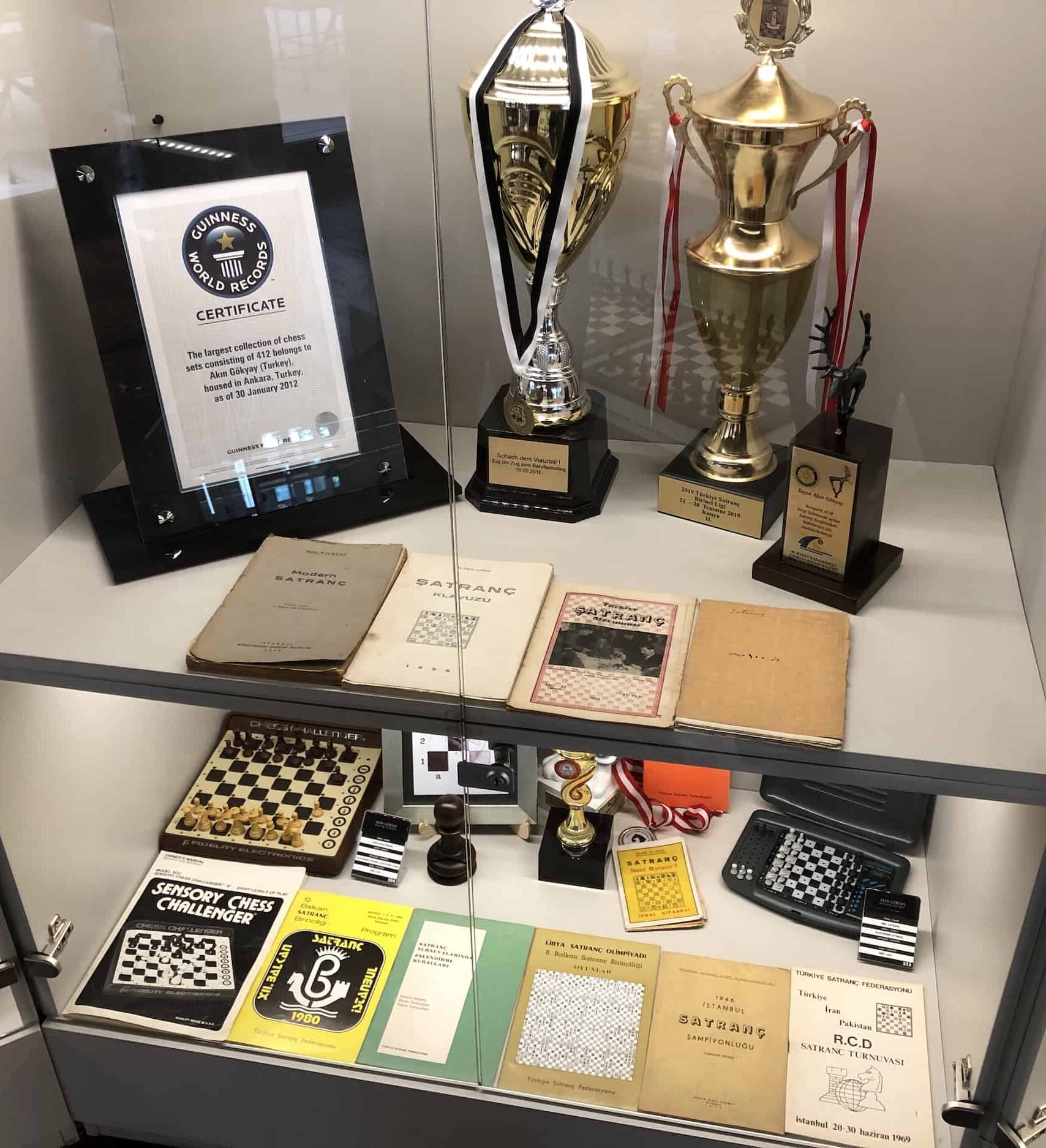 Guinness World Records certificate, trophies, and books