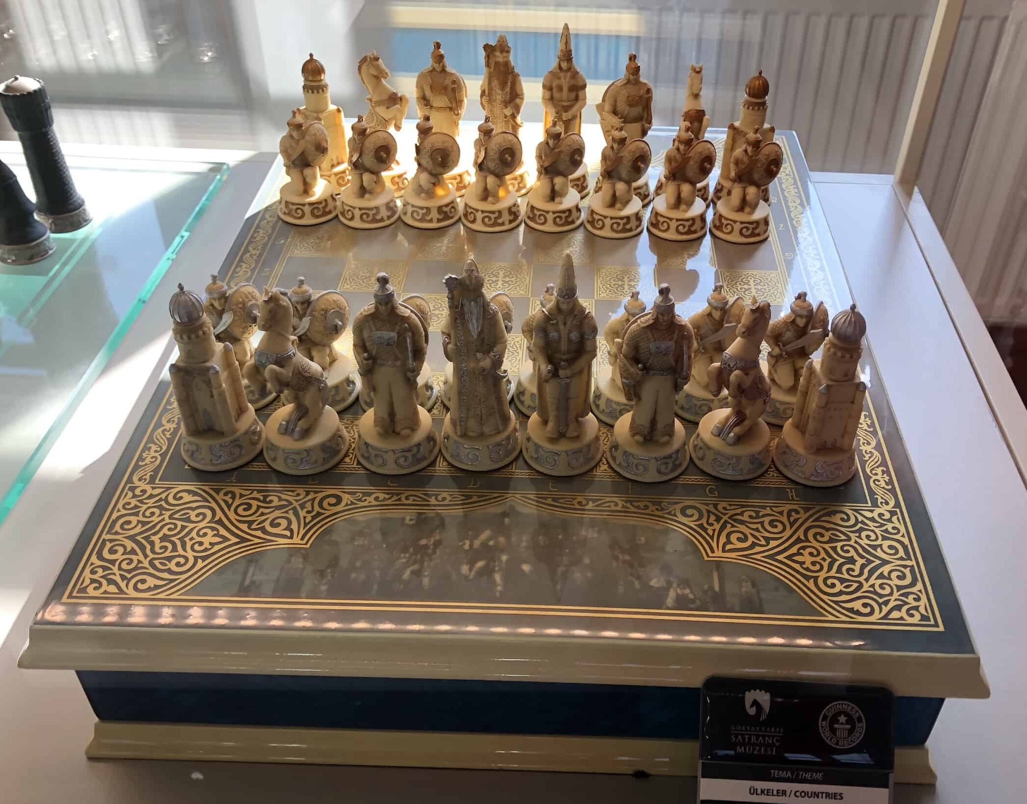 Ceramic chess set with gold and silver inlays (Kazakhstan)