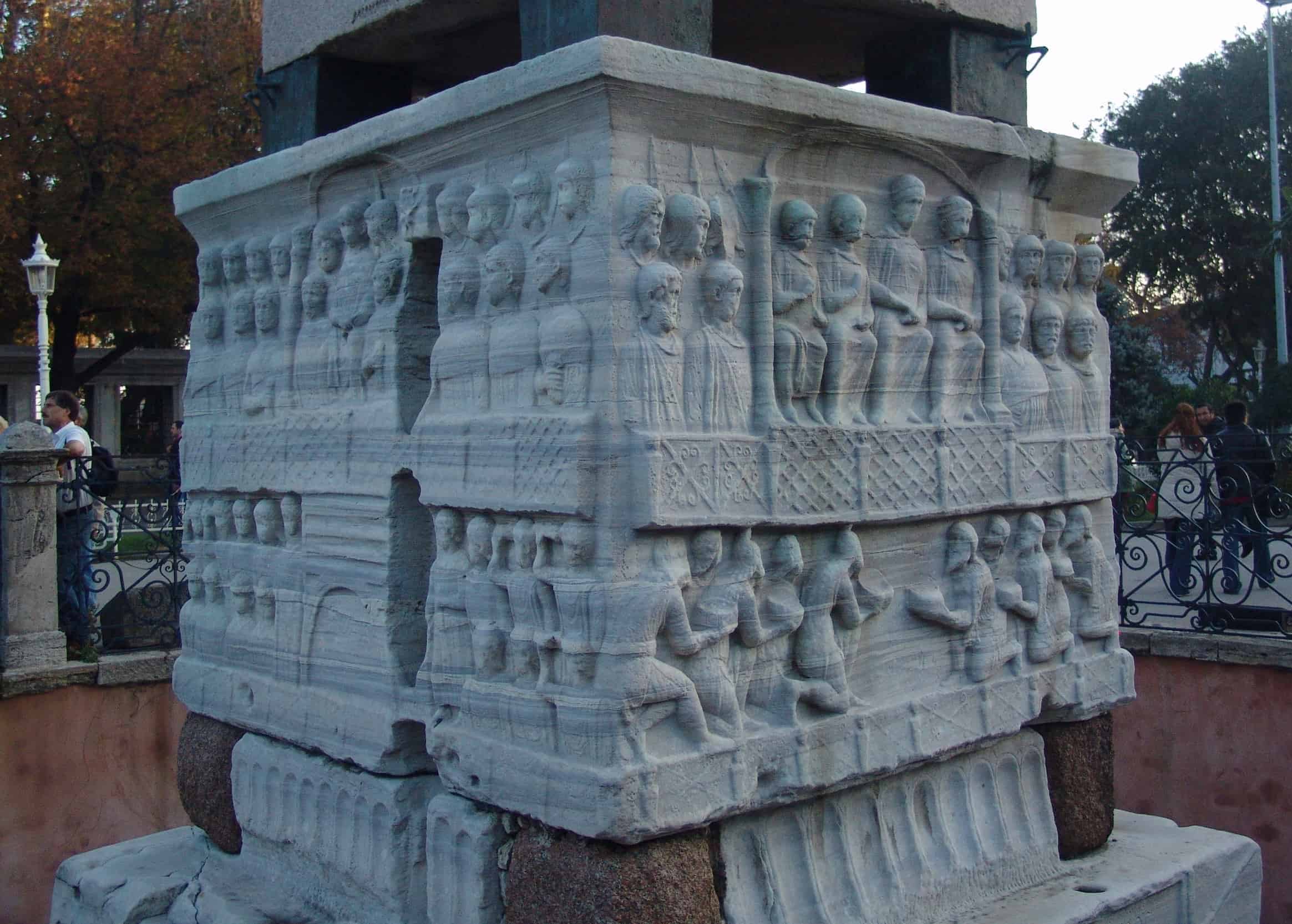 Theodosius I and his court (north face - left) and the submission of the barbarians (west face - right) on the pedestal of the Obelisk of Thutmose III