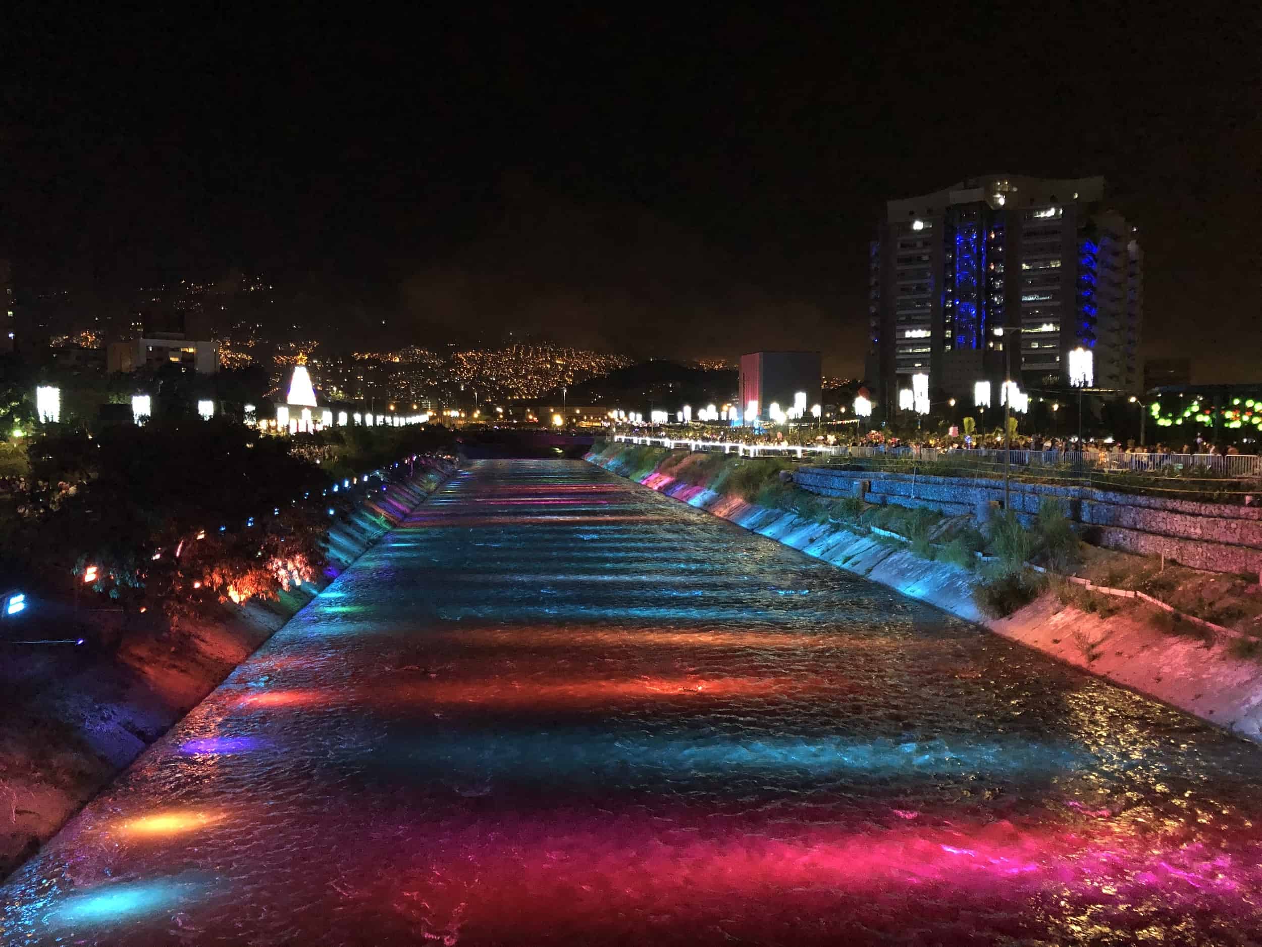 The Medellín River lit up at night during Christmas at Medellín River Parks in Medellín, Antioquia, Colombia