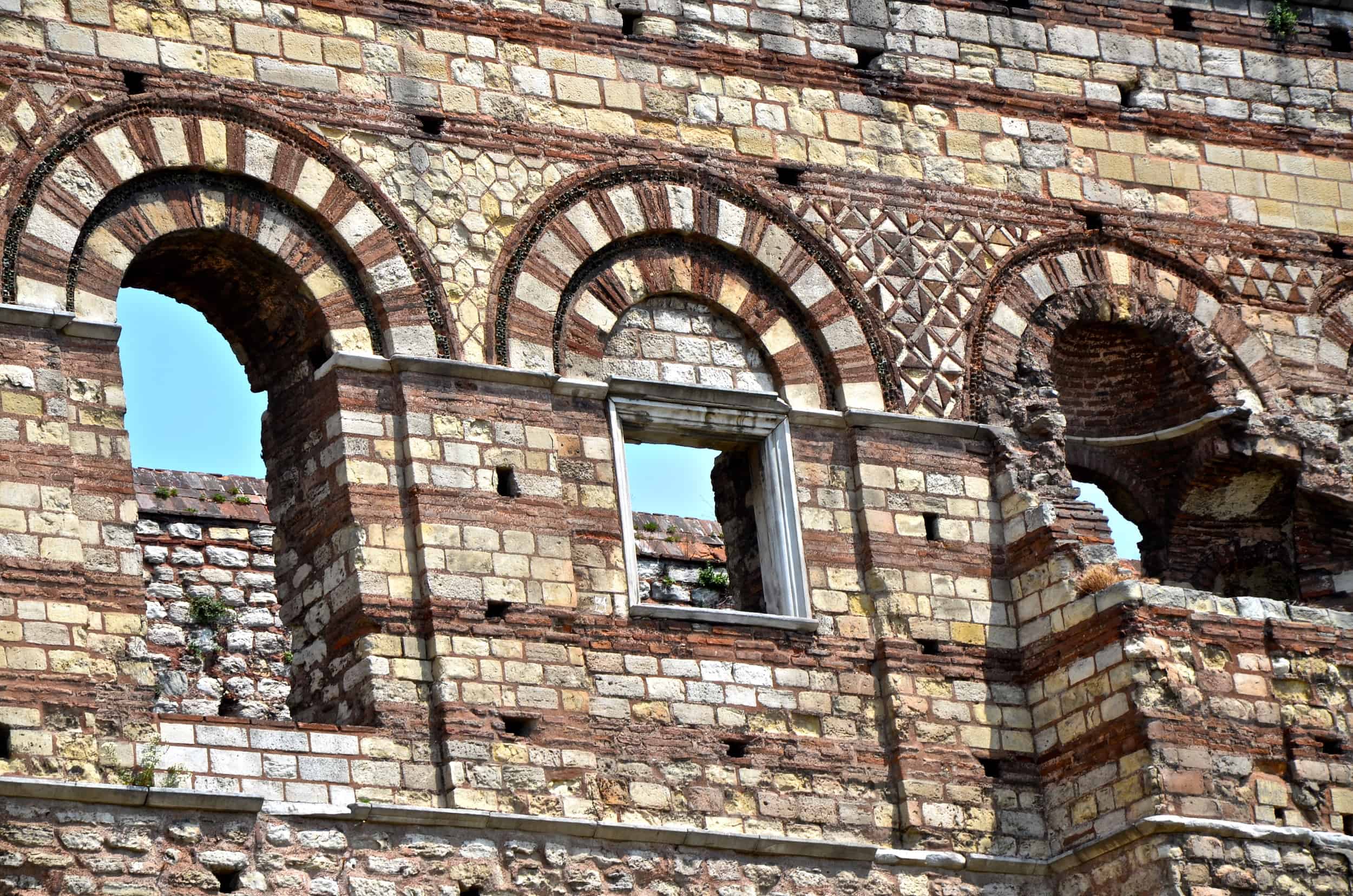 Windows on the Palace of the Porphyrogenitus before restoration in May 2012 in Istanbul, Turkey