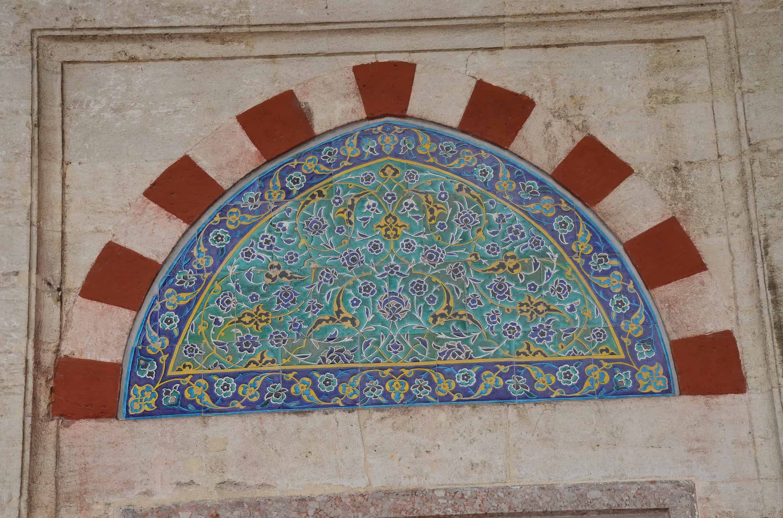 Tiles above a window in the courtyard