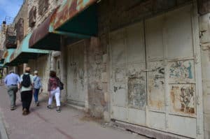 Shuttered shops on al-Shuhada Street in Hebron, Palestine