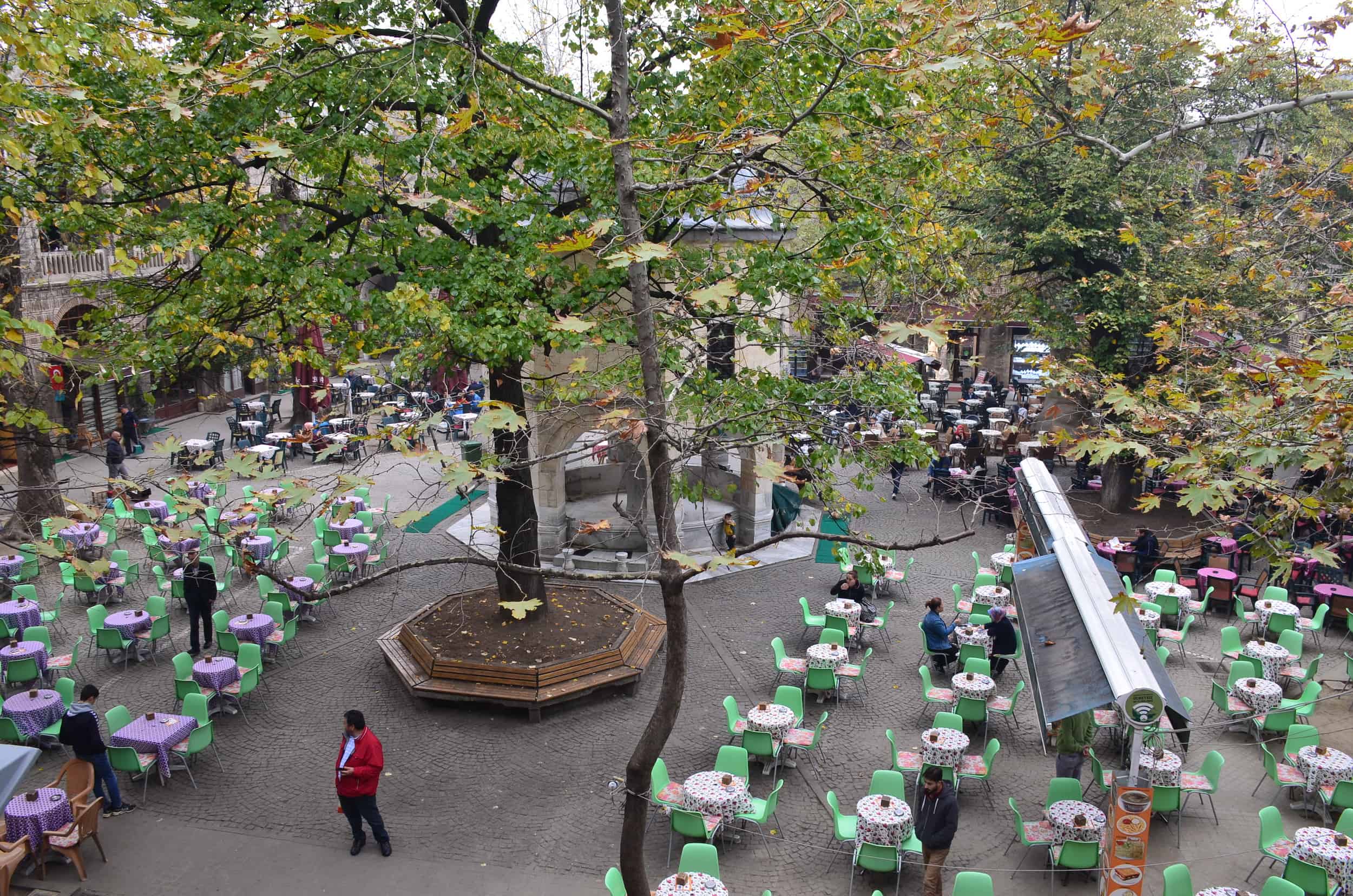 Tables in the courtyard at Koza Han in Bursa, Turkey