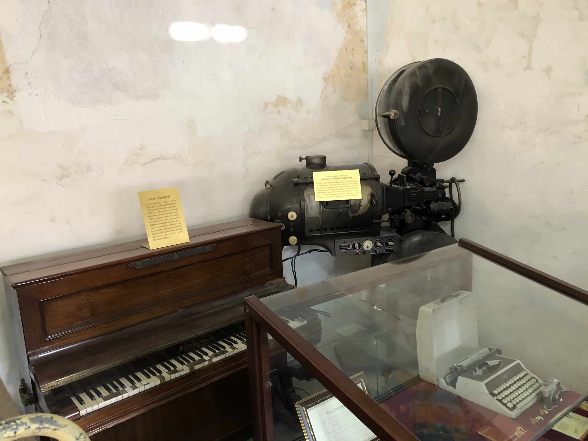 Piano (left) and film projector (right) in the 6th Ward