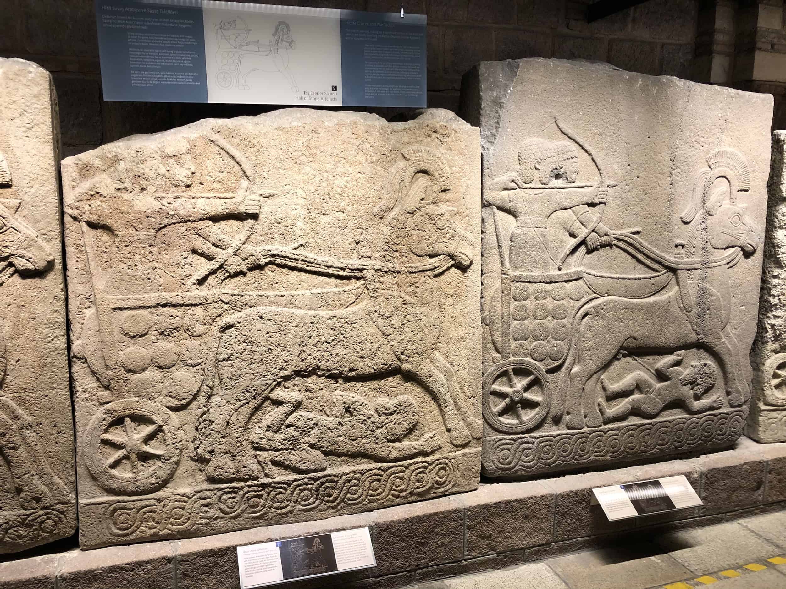 Relief of Hittite chariots and war tactics on the orthostats of the Long Wall (Kargamış) at the Museum of Anatolian Civilizations in Ankara, Turkey