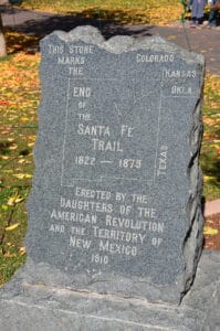 Historical marker commemorating the end of the Santa Fe Trail placed by the Daughters of the American Revolution and Territory of New Mexico in 1910 on Santa Fe Plaza in Santa Fe, New Mexico