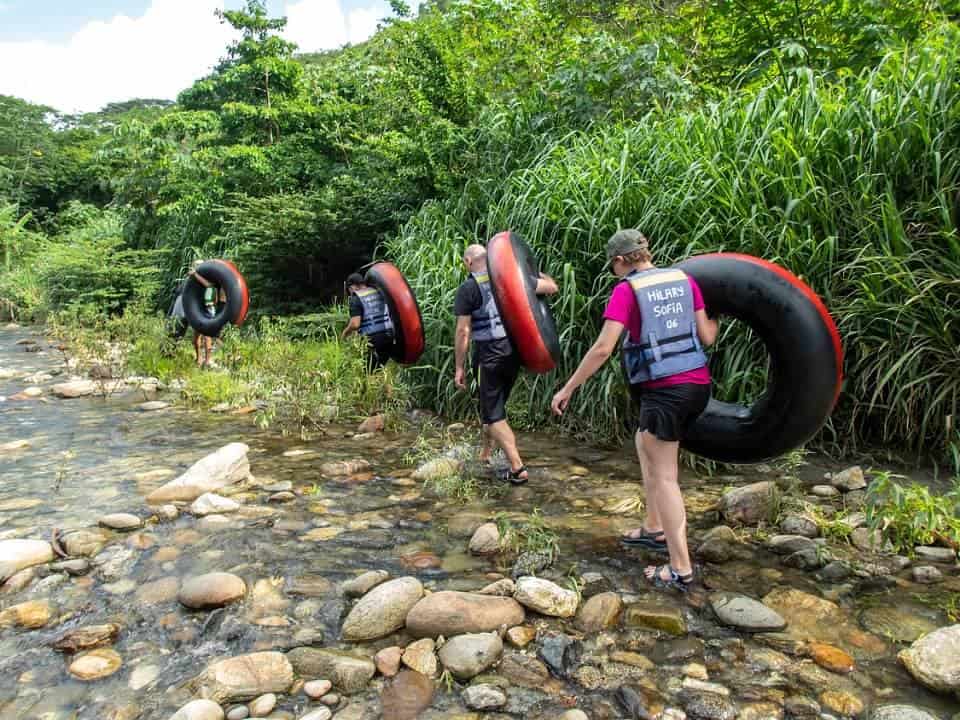 Walking with our inner tubes along the Buritaca River