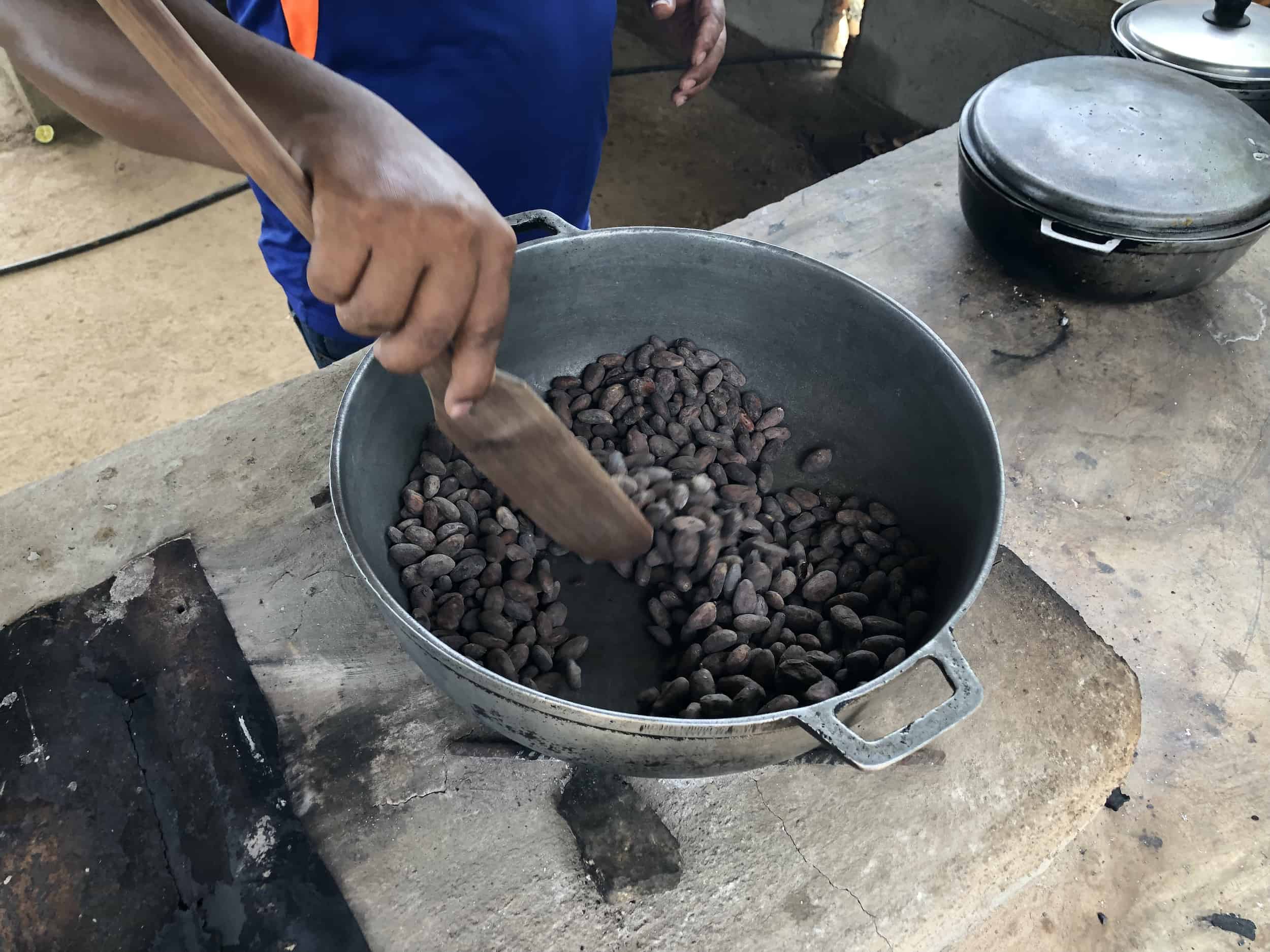 Stirring the cacao beans on the cacao tour near Buritaca, Colombia