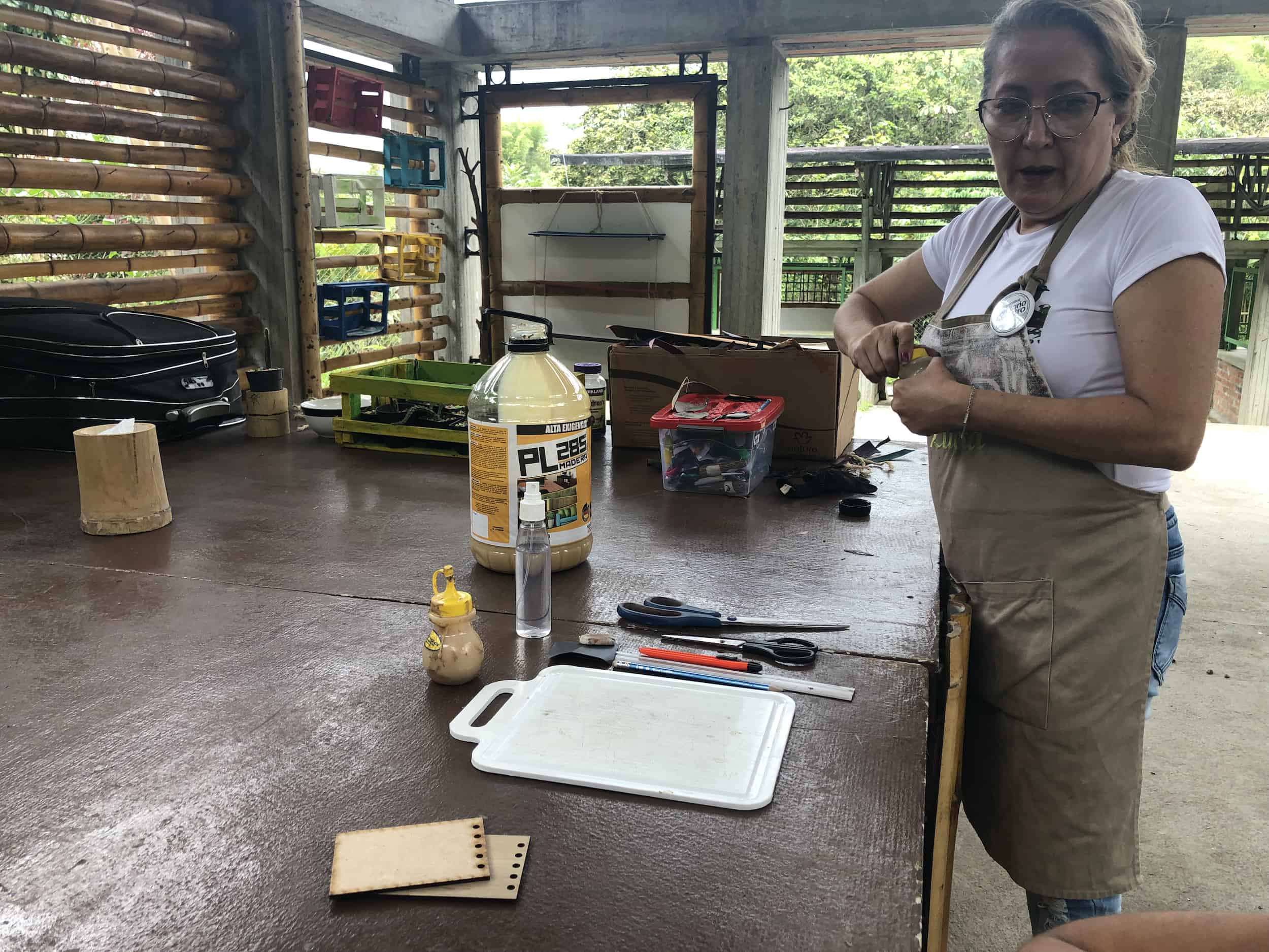 Artist setting up the supplies for the workshop on the Bamboo and Guadua Educational Hike