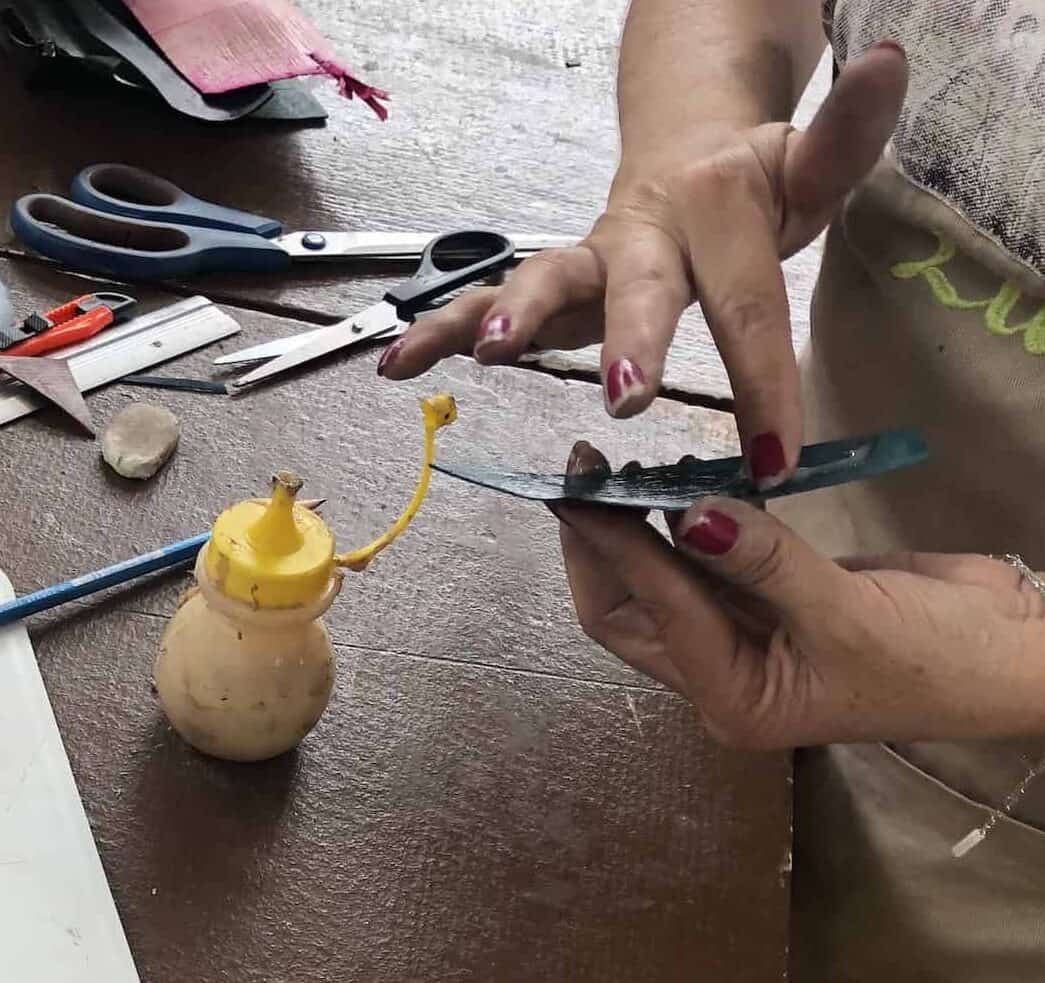 Applying glue on the Bamboo and Guadua Educational Hike