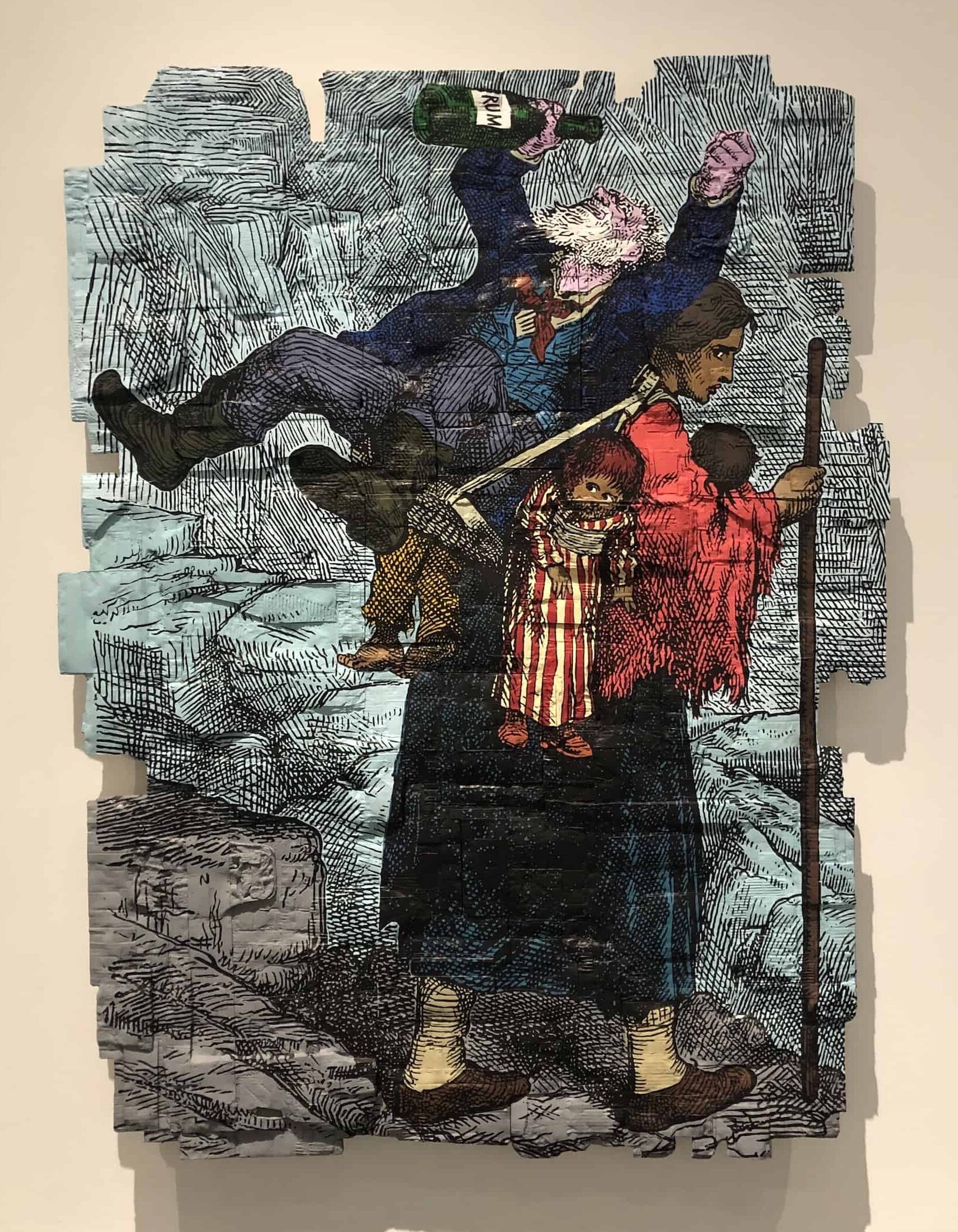 Cardboard work depicting the burden of wives in the Andrea Bowers exhibition