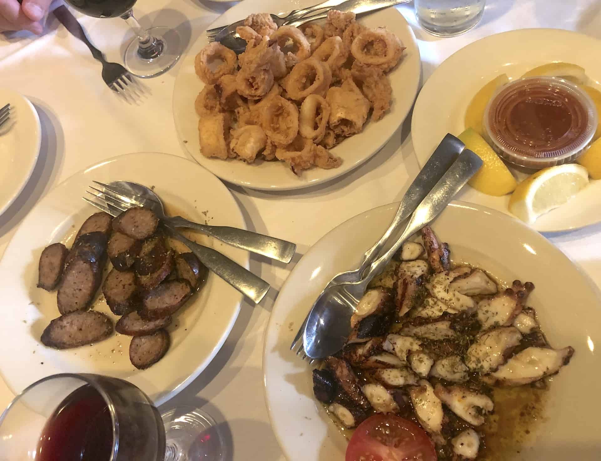 Calamari (top), loukaniko (bottom left), and octopus (bottom right) at Greek Islands Restaurant 