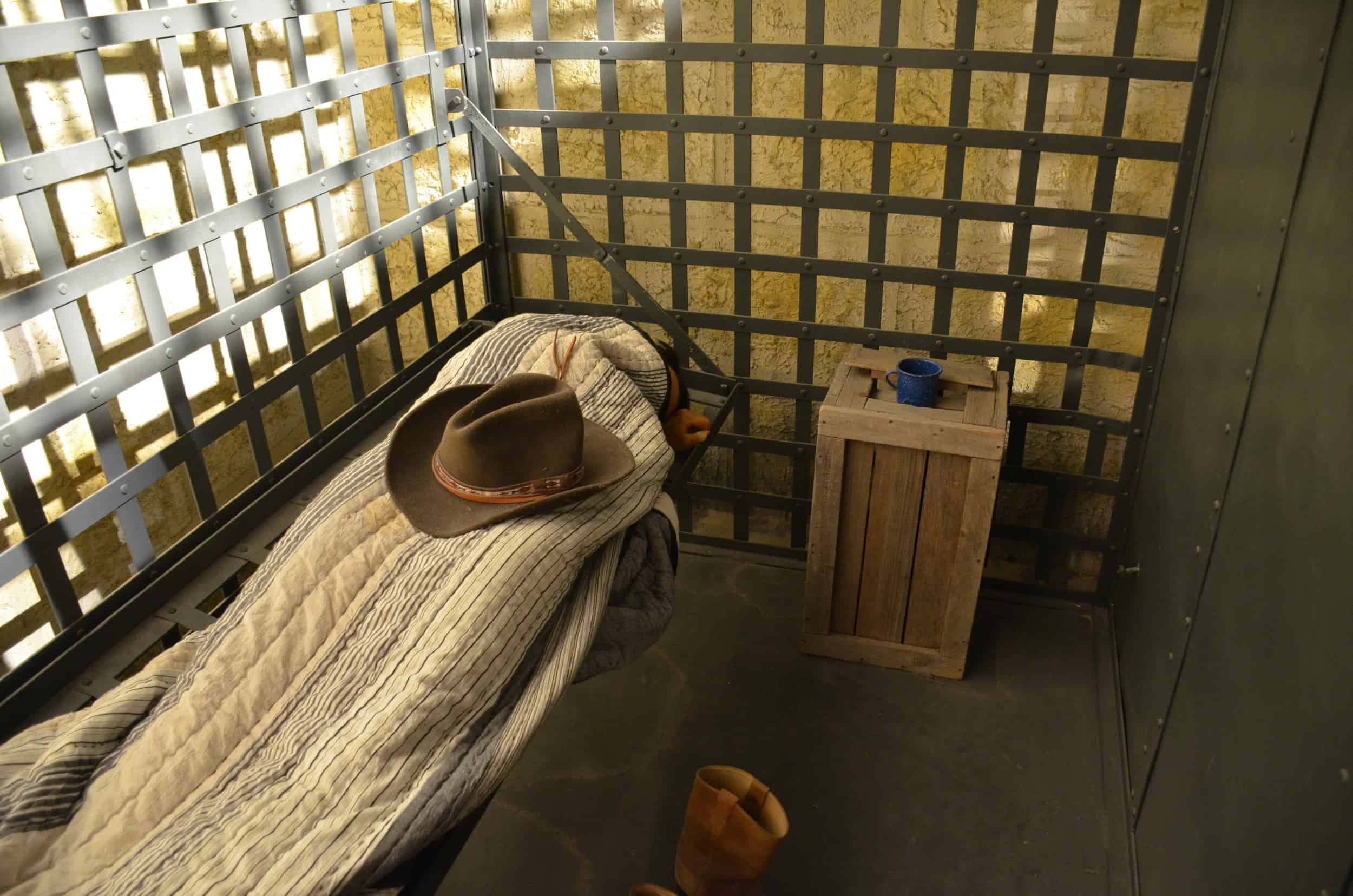Sleeping prisoner in Ranger Town at the Texas Ranger Museum in San Antonio, Texas
