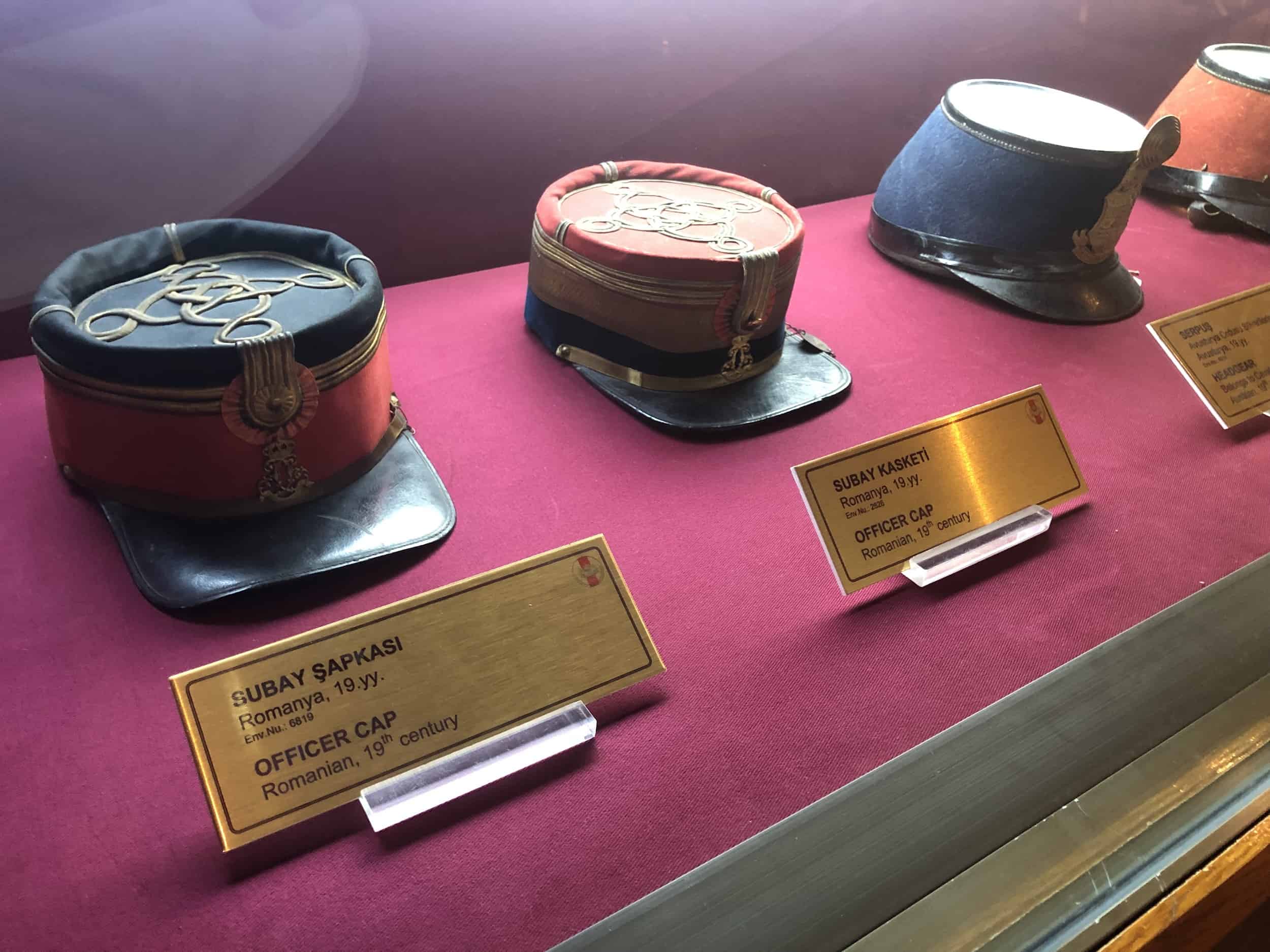 19th century Romanian officer's caps in the Constitutional Period Hall at the Harbiye Military Museum in Istanbul, Turkey