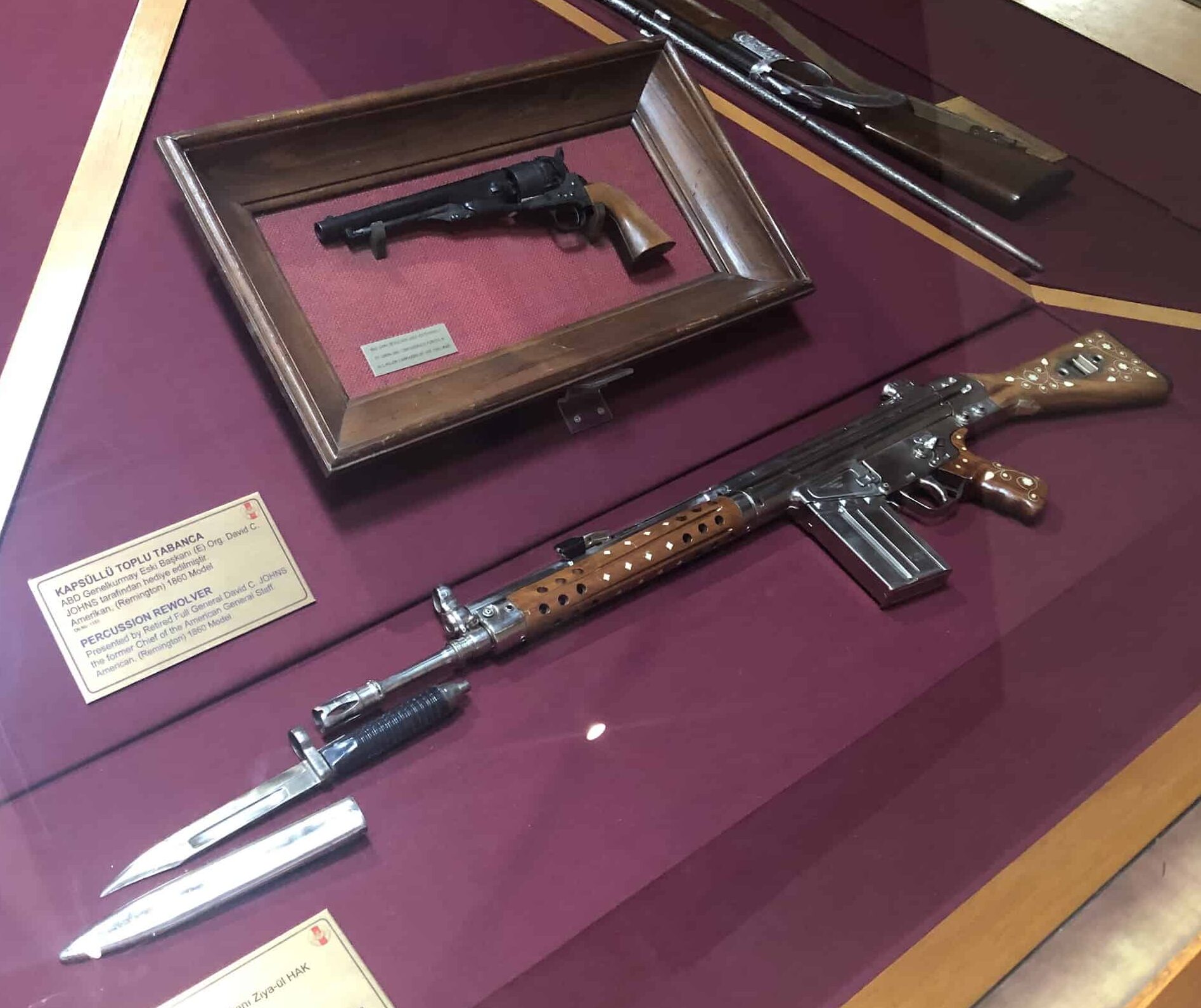 Revolver from the United States (top) and rifle from Pakistan