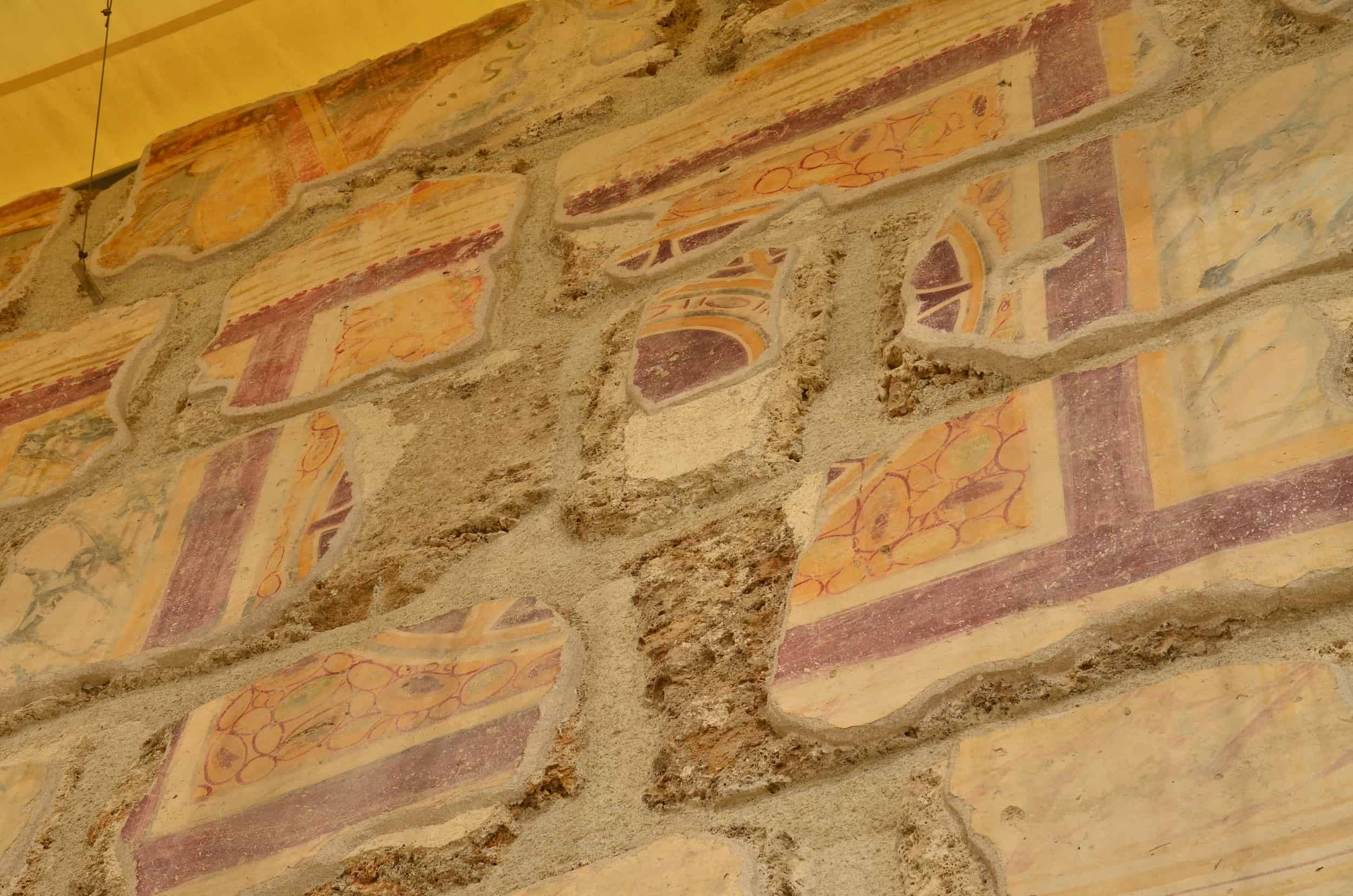Frescoes on the wall of the west portico in the North Agora
