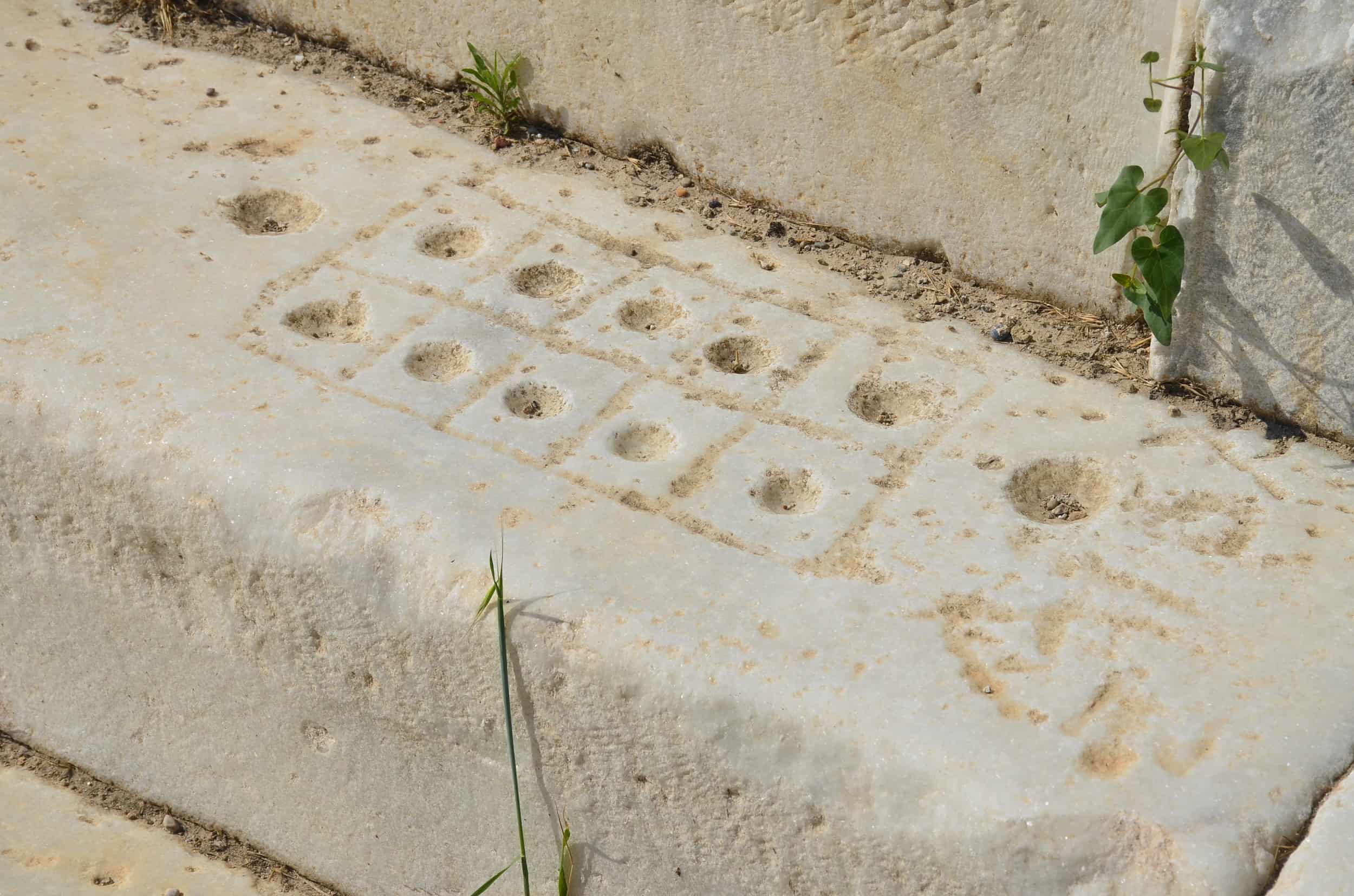 Ancient form of backgammon in the south portico of the North Agora in Laodicea