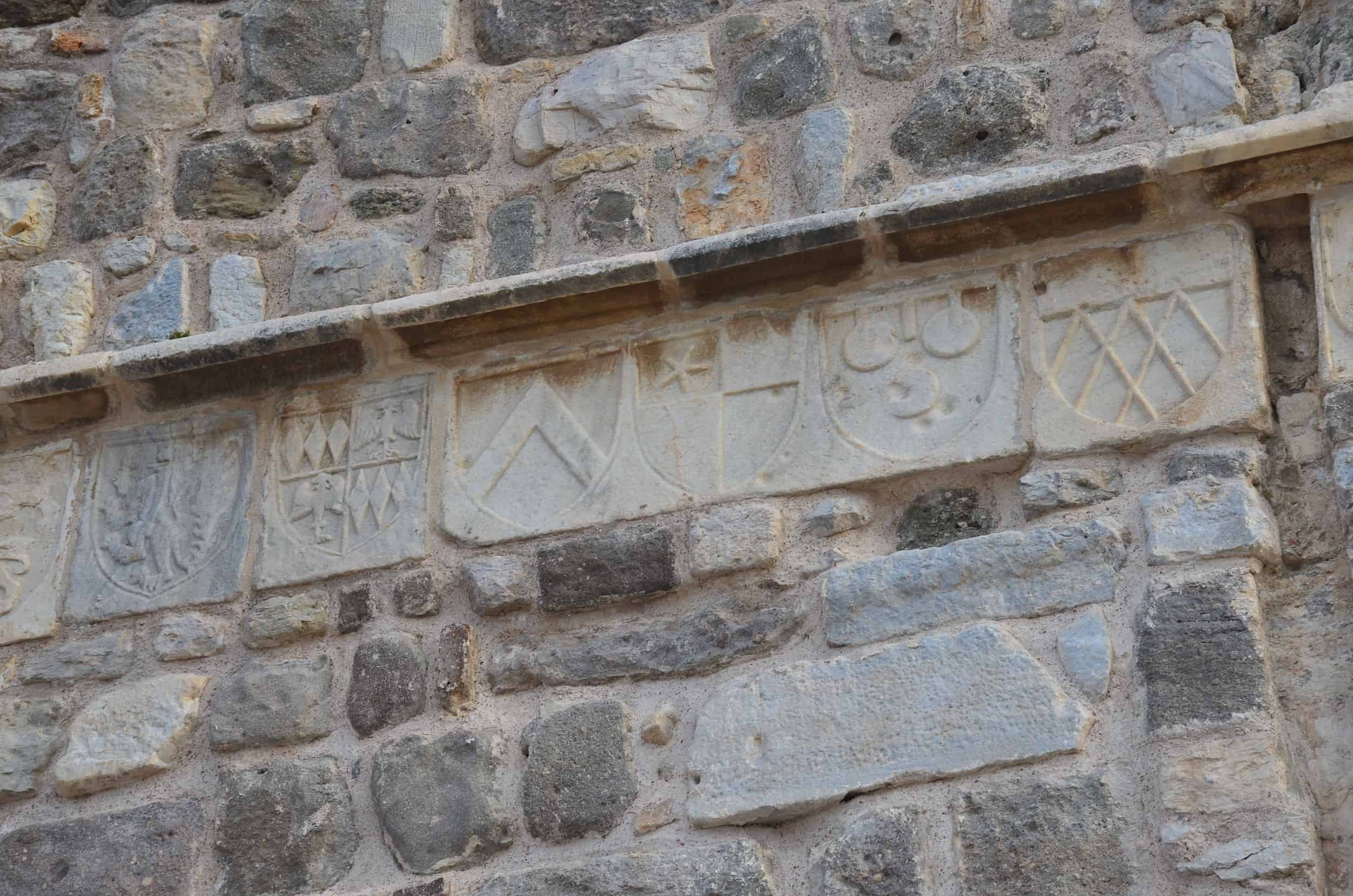 Coats of arms of English nobles on the north façade of the English Tower at Bodrum Castle in Turkey