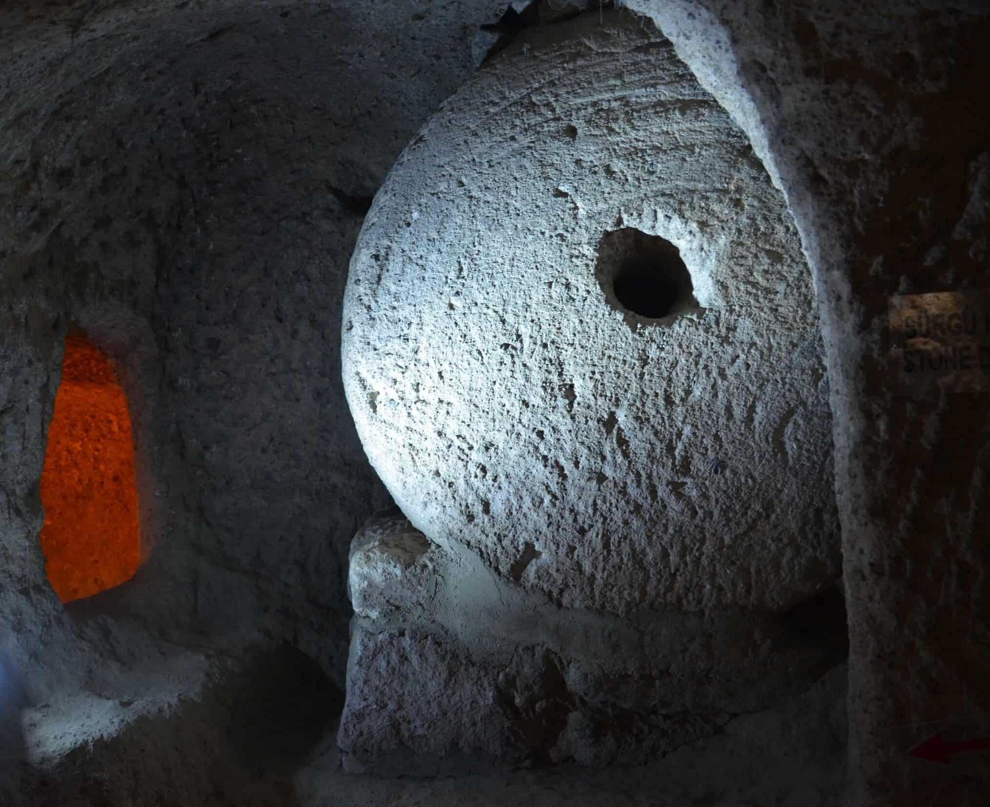 Stone door at Kaymaklı Underground City in Cappadocia, Turkey